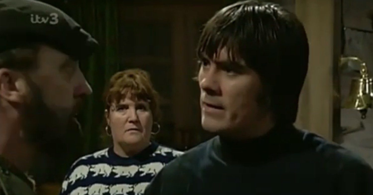 Young Zak and Cain face off on Emmerdale while Lisa watches (Credit: ITV/YouTube)