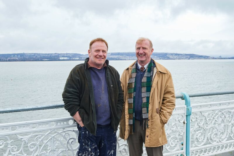 Mark Lewis Jones as Eddie O'Connor, and Steffan Rhodro as Colin White in Men Up