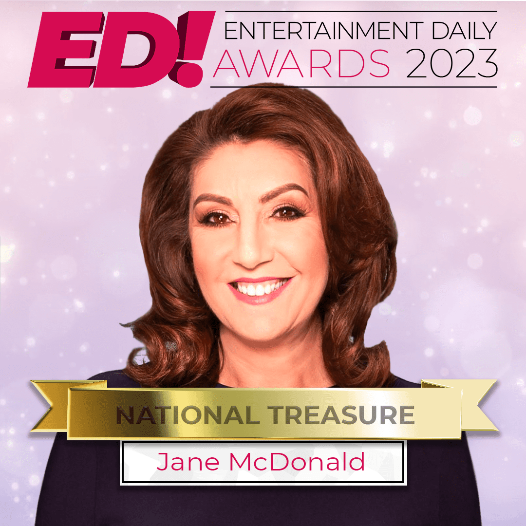 Jane McDonald smiling in a black dress