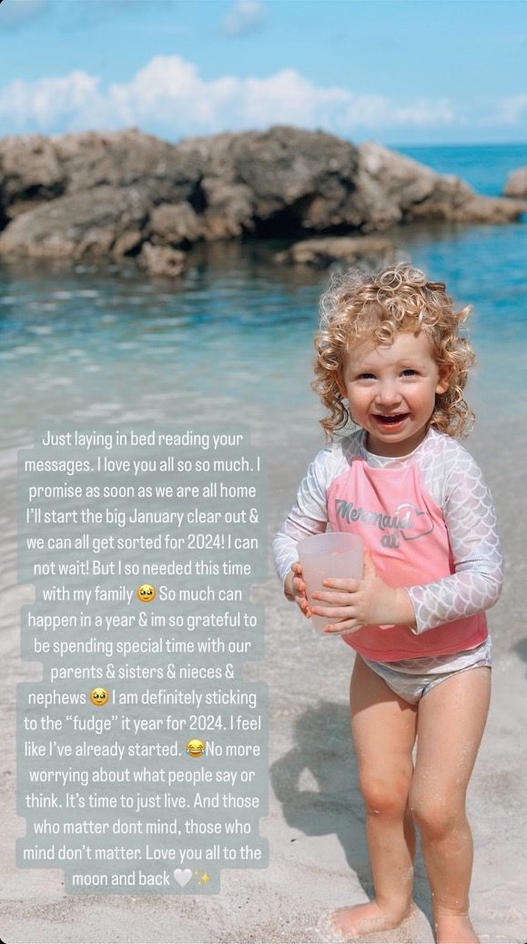 Stacey Solomon's little girl in the sea in a swimsuit
