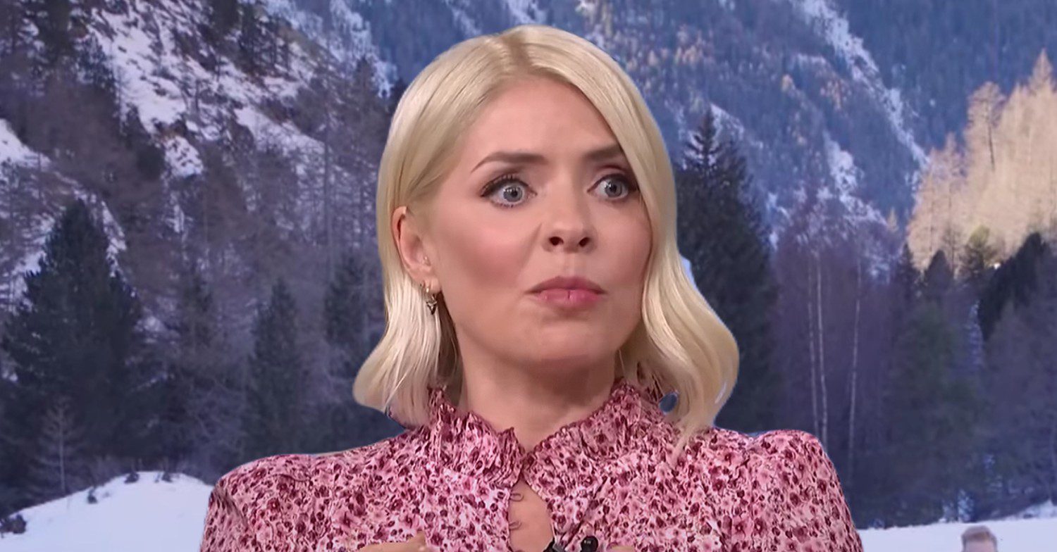 Holly Willoughby looking serious with Freeze The Fear background