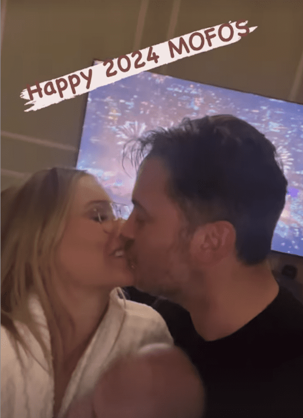 Laura Anderson and Gary Lucy kiss on the lips