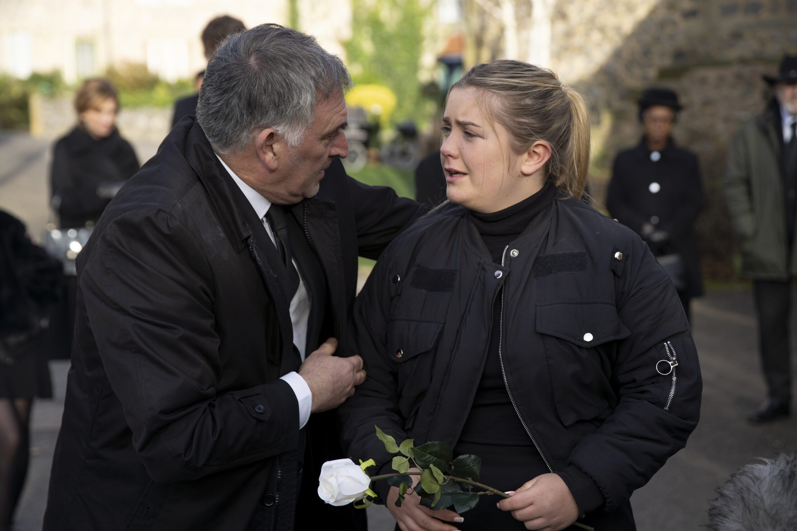 Bob Hope supports his crying daughter Cathy Hope at Heath's funeral