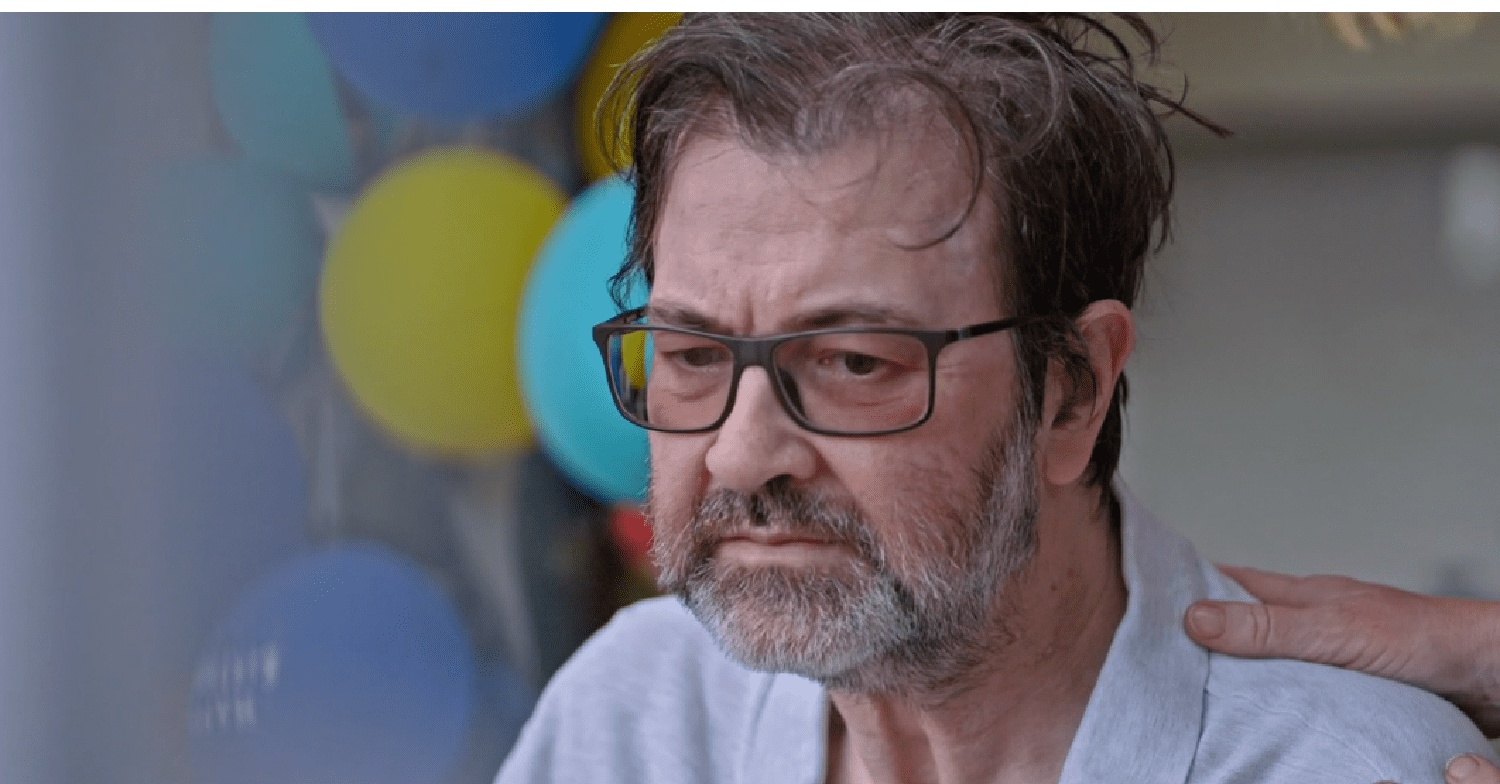 Derek Draper looking sombre in Caring for Derek documentary