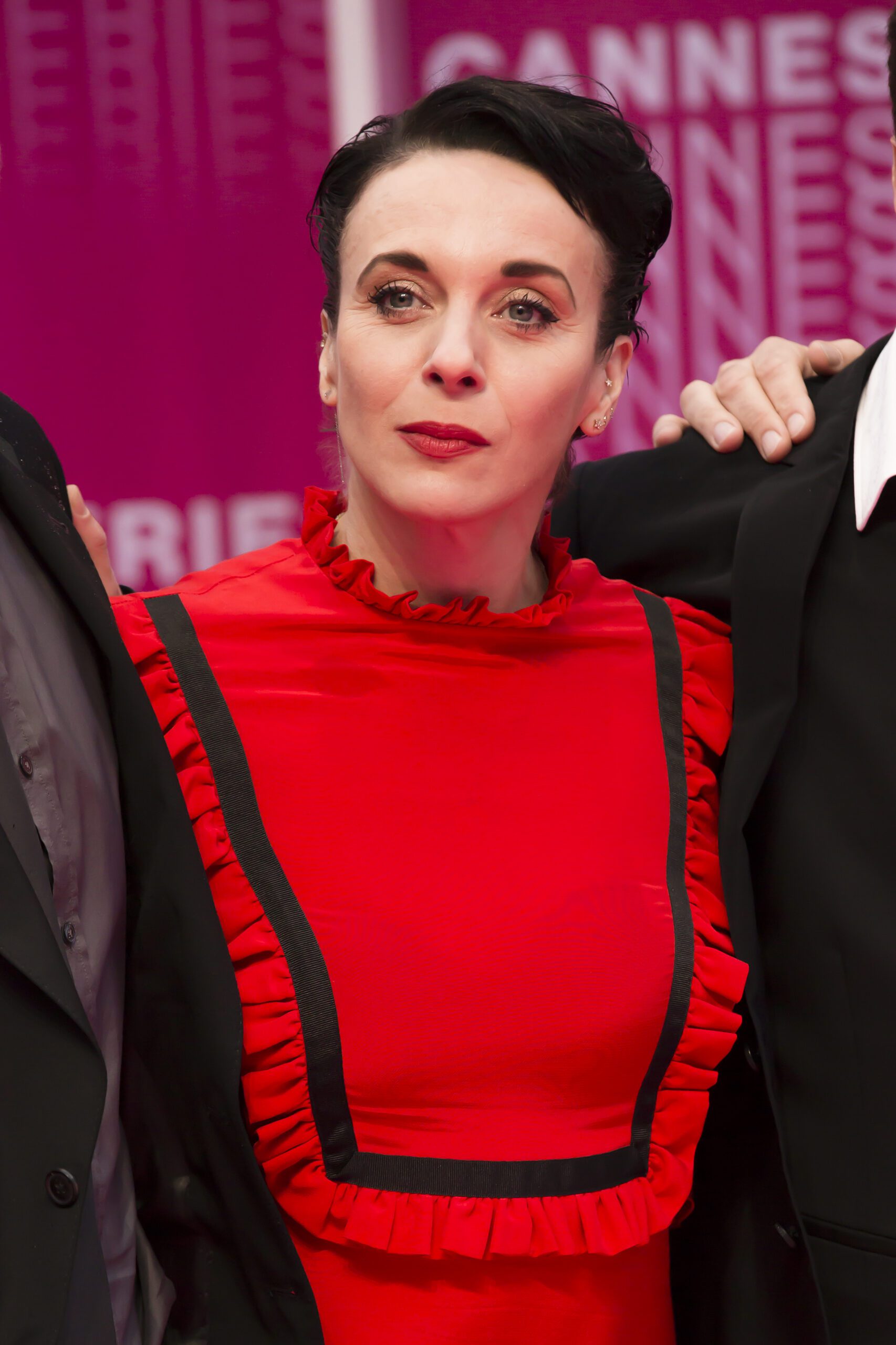 Amanda Abbington wearing a red dress