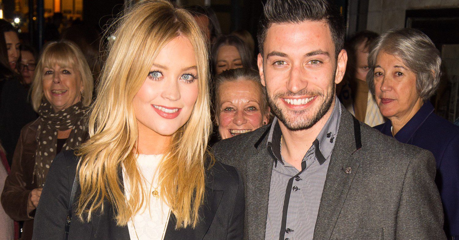 Giovanni Pernice and Laura Whitmore smiling at event