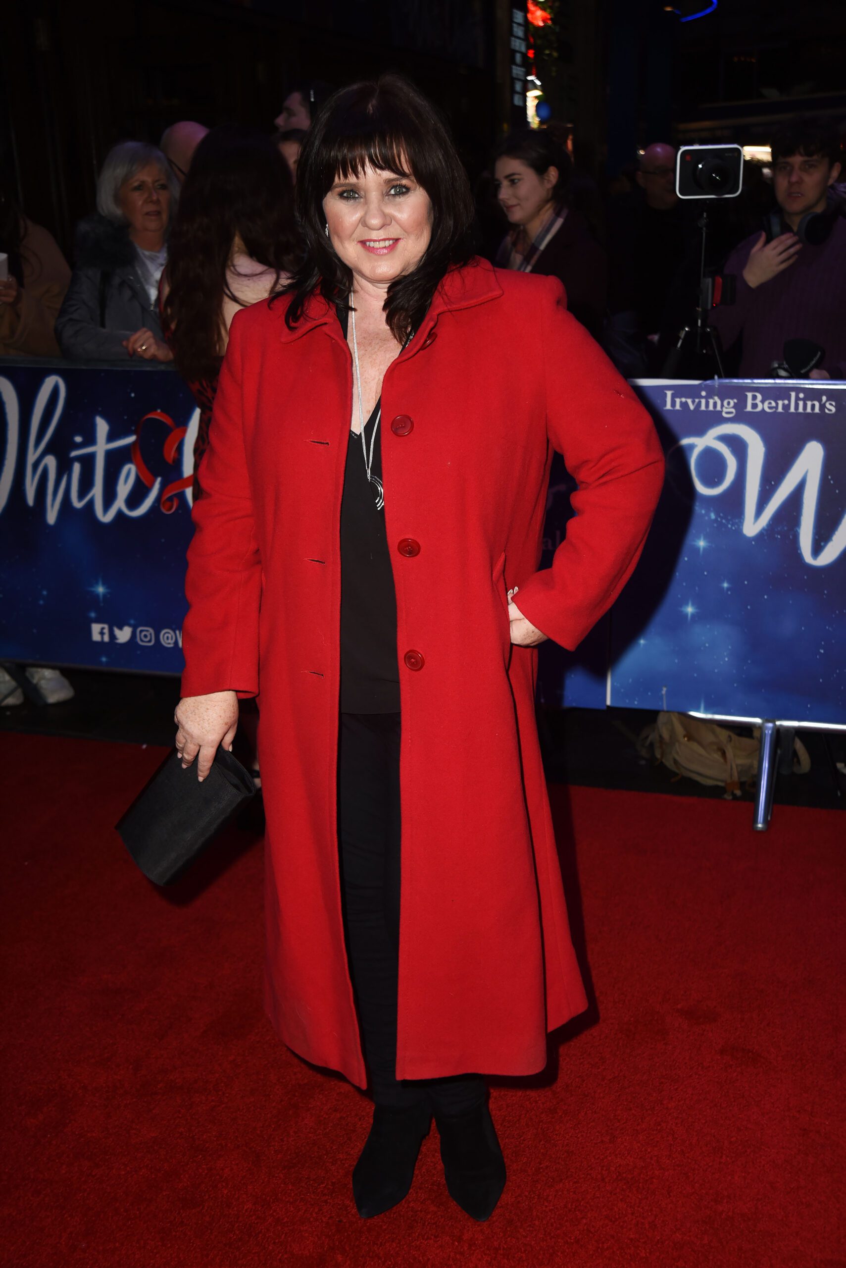 Coleen Nolan in a red coat