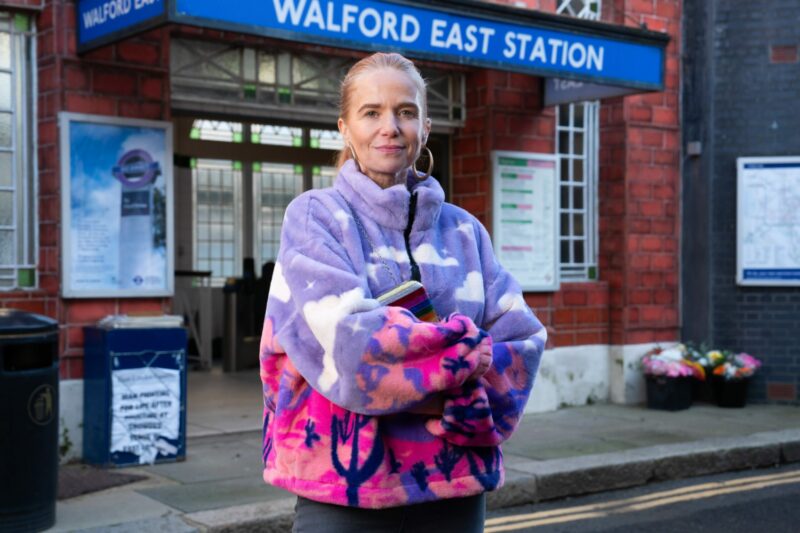 Patsy Palmer as Bianca Jackson in EastEnders smiles outside Walford East station
