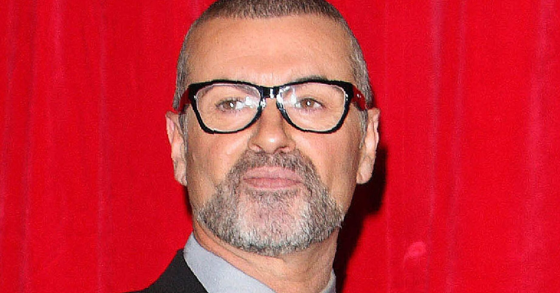 George Michael posing