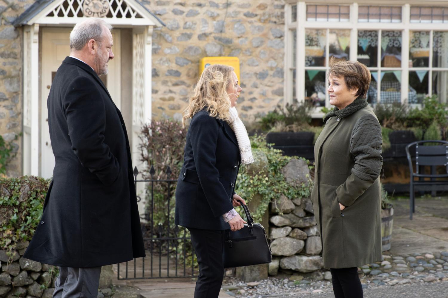 Emmerdale's Jimmy and Nicola are talking to Brenda outside