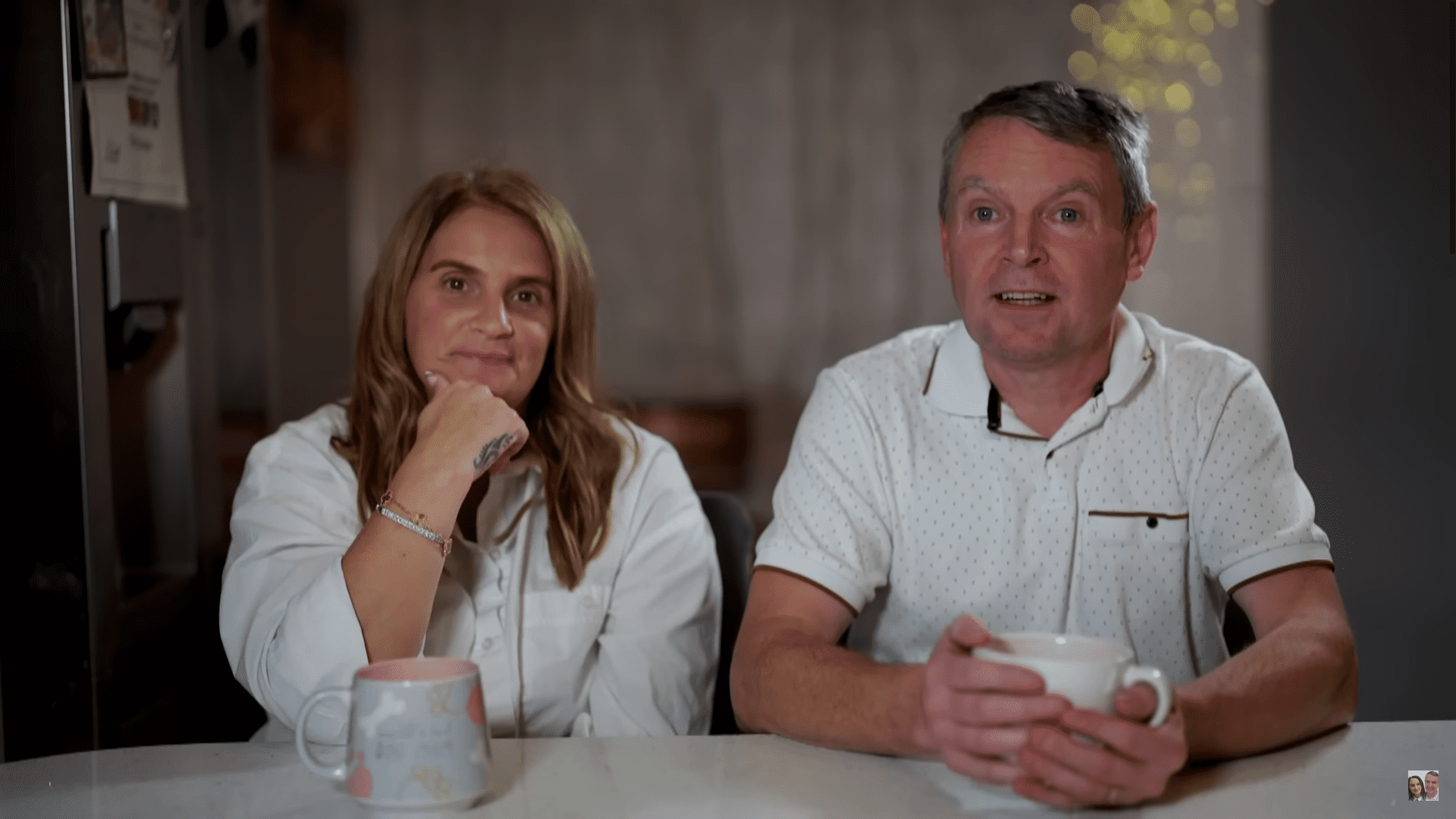 Sue and Noel Radford at their table talking