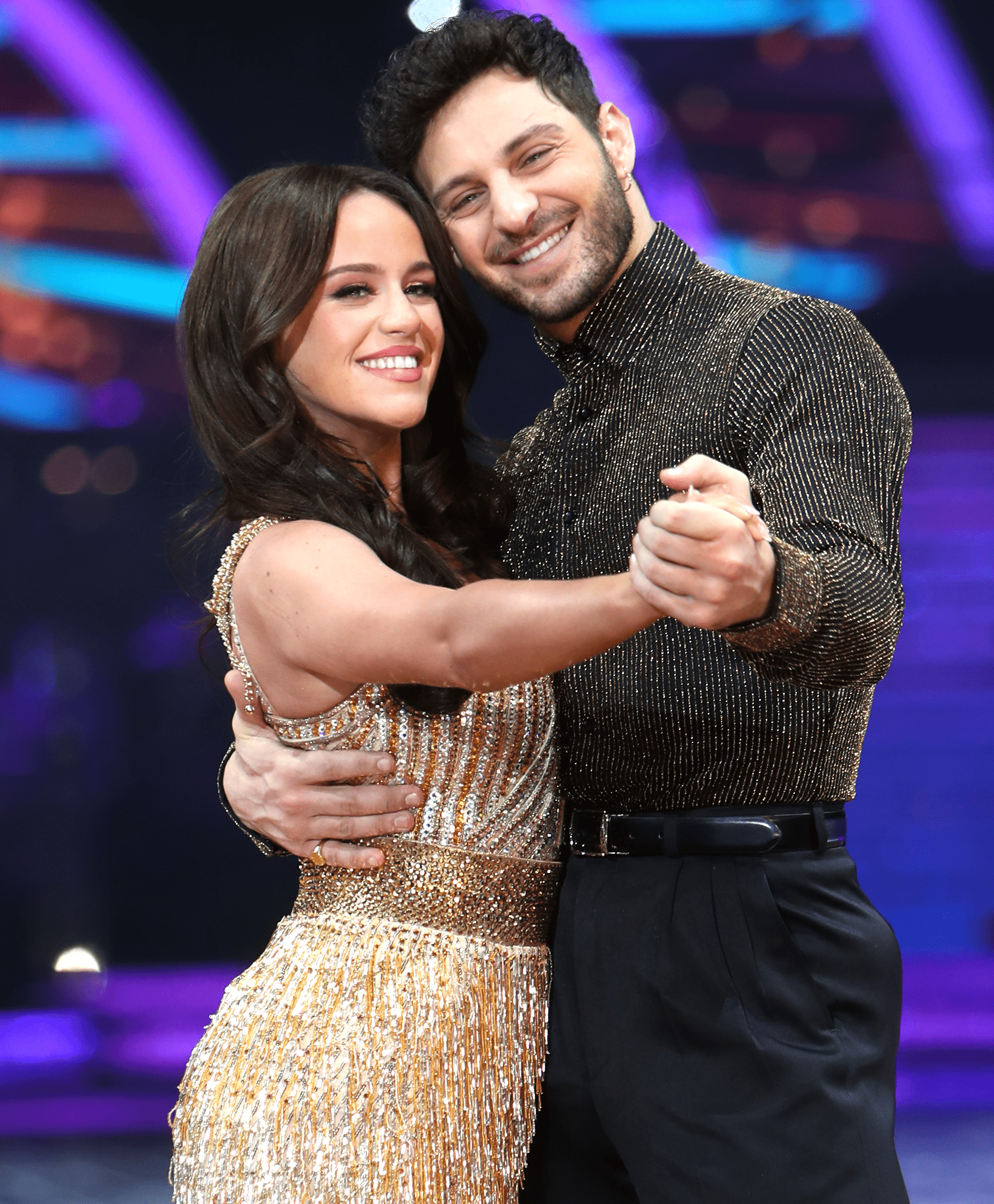 Ellie Leach and Vito Coppola smiling and holding hands at Strictly tour
