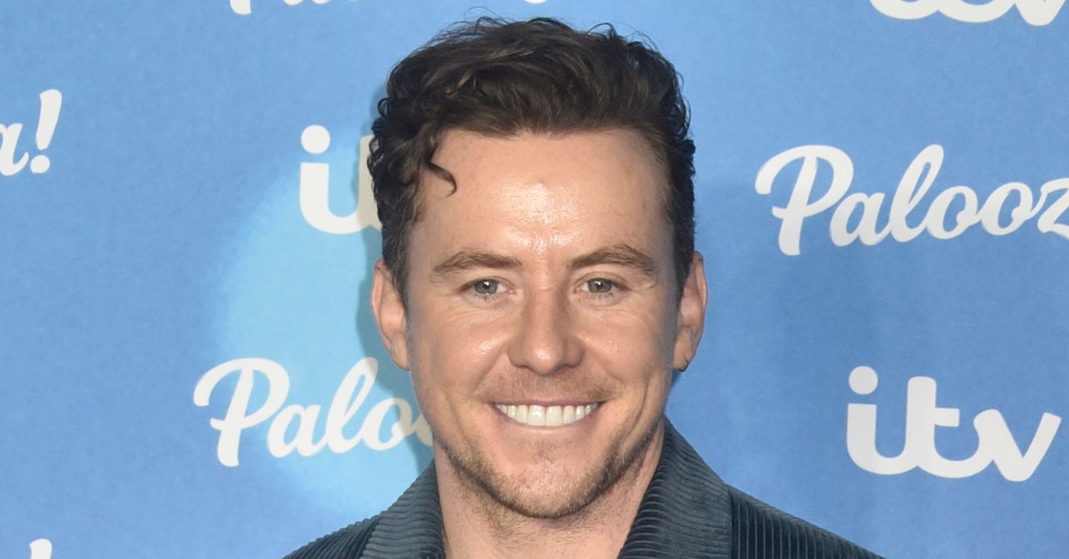Danny Jones smiling on the red carpet