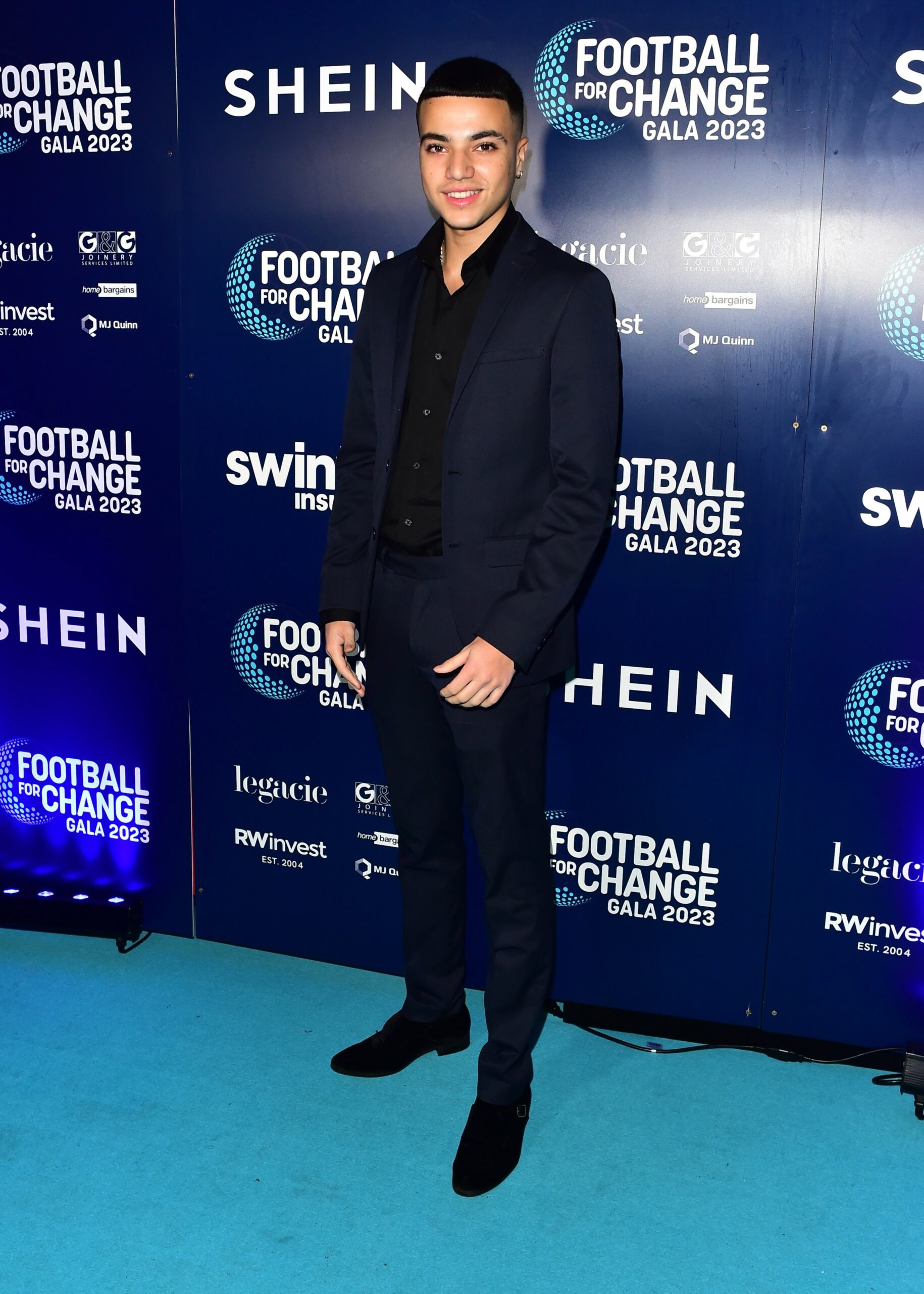 Junior Andre smiling at event