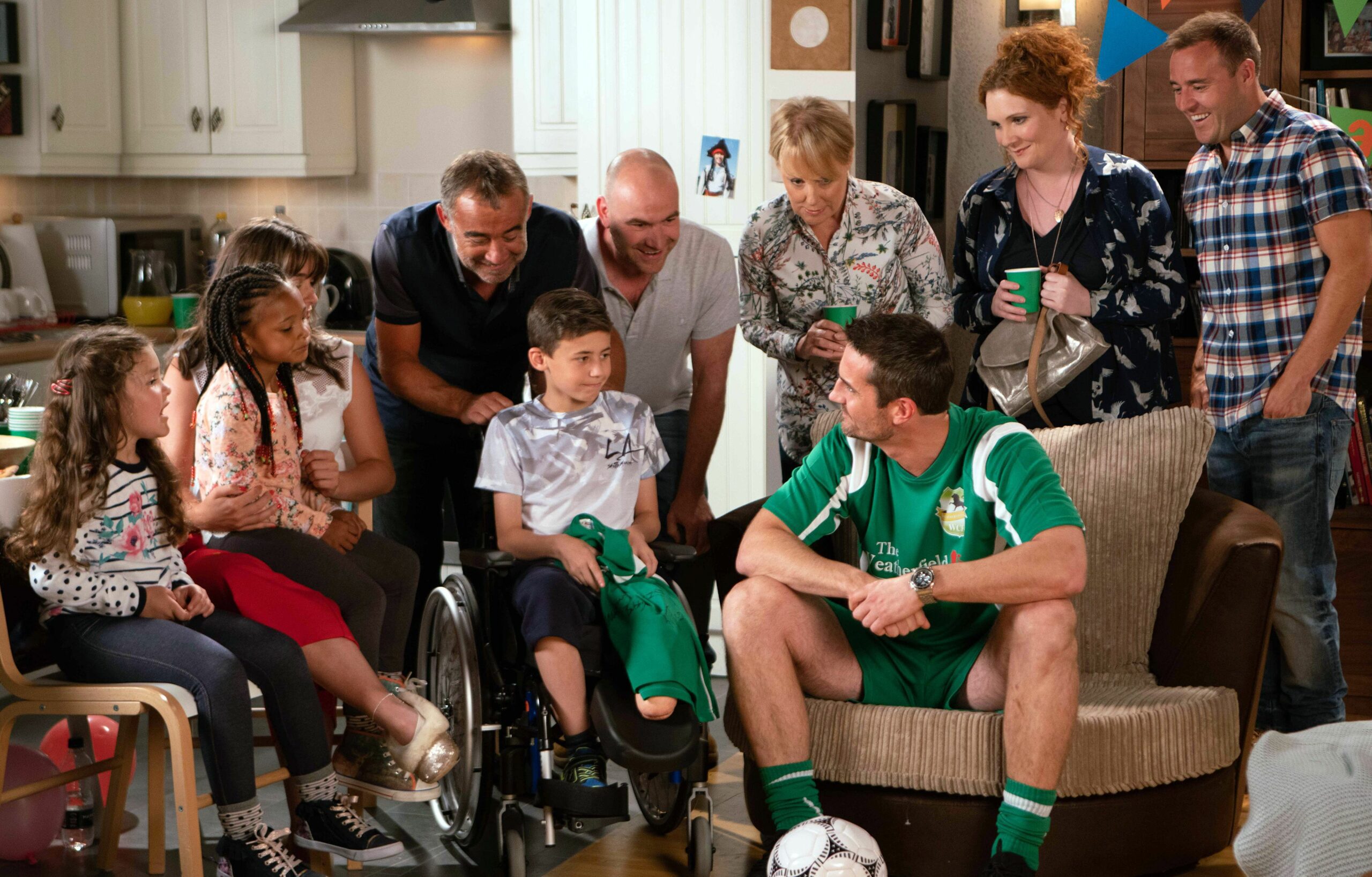 Kevin Webster, as played by Michael Le Vell, brings Jack Webster, as played by Kyran Bowes, home in his wheelchair. As everybody makes a fuss of him, Jack's underwhelmed and Fiz worries they've misjudged his mood. Tommy Orpington, as played by Matt Milburn, makes an entrance in his full County kit at Jack's party.