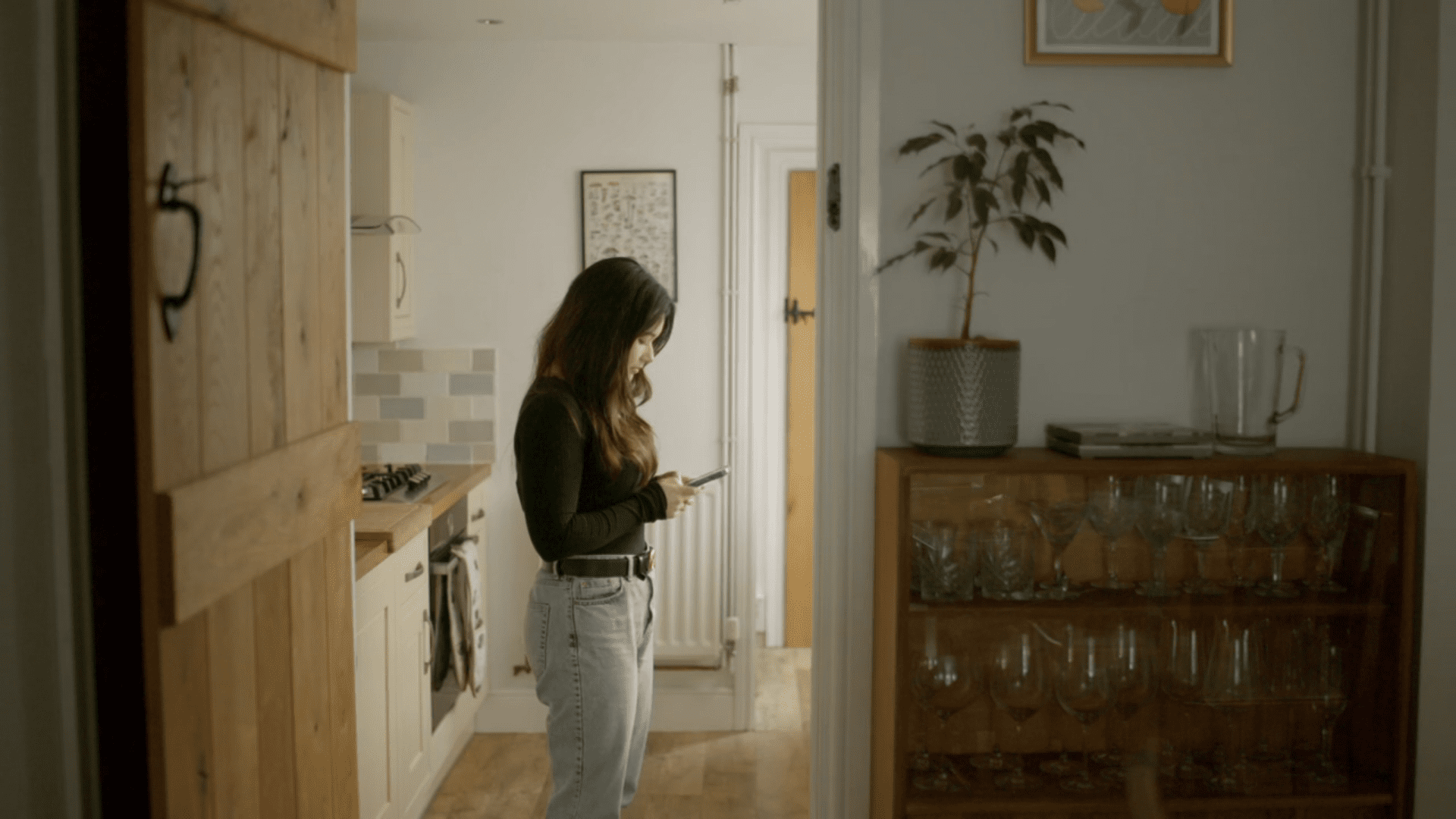 Woman on Born From The Same Stranger texting on her phone