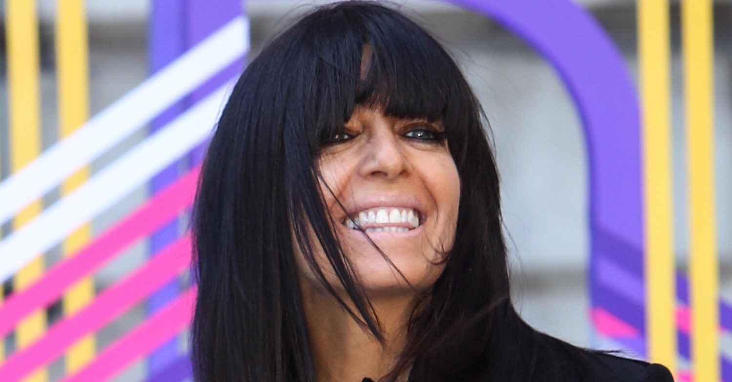Claudia Winkleman smiling at event