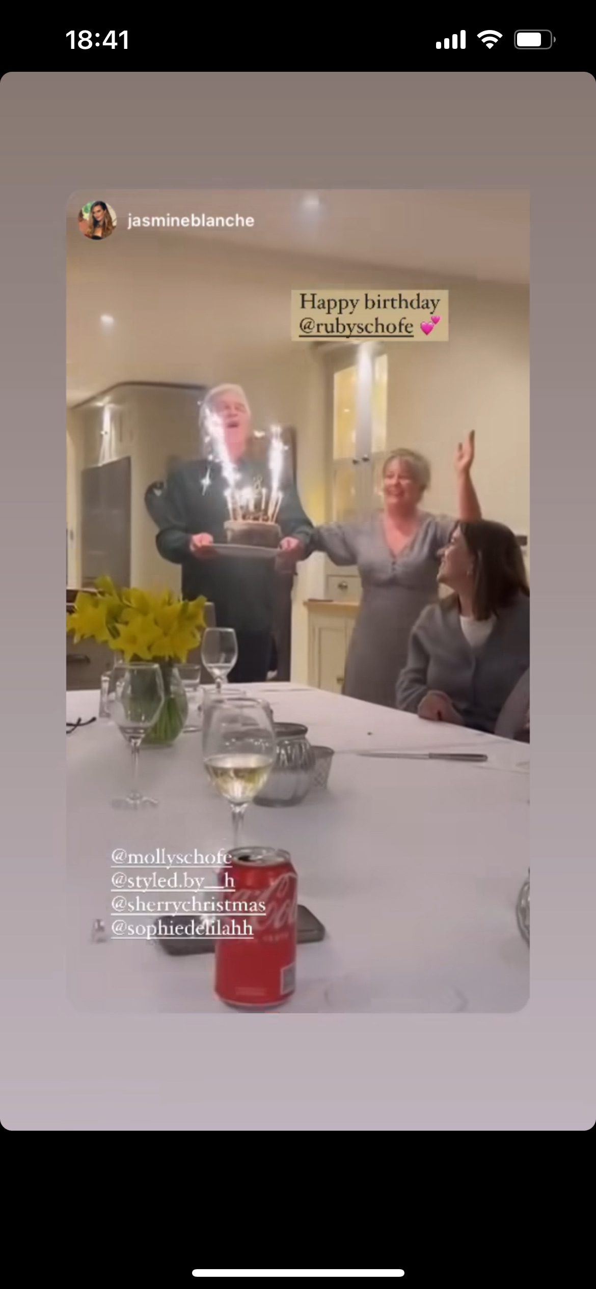 Phillip Schofield carrying a cake