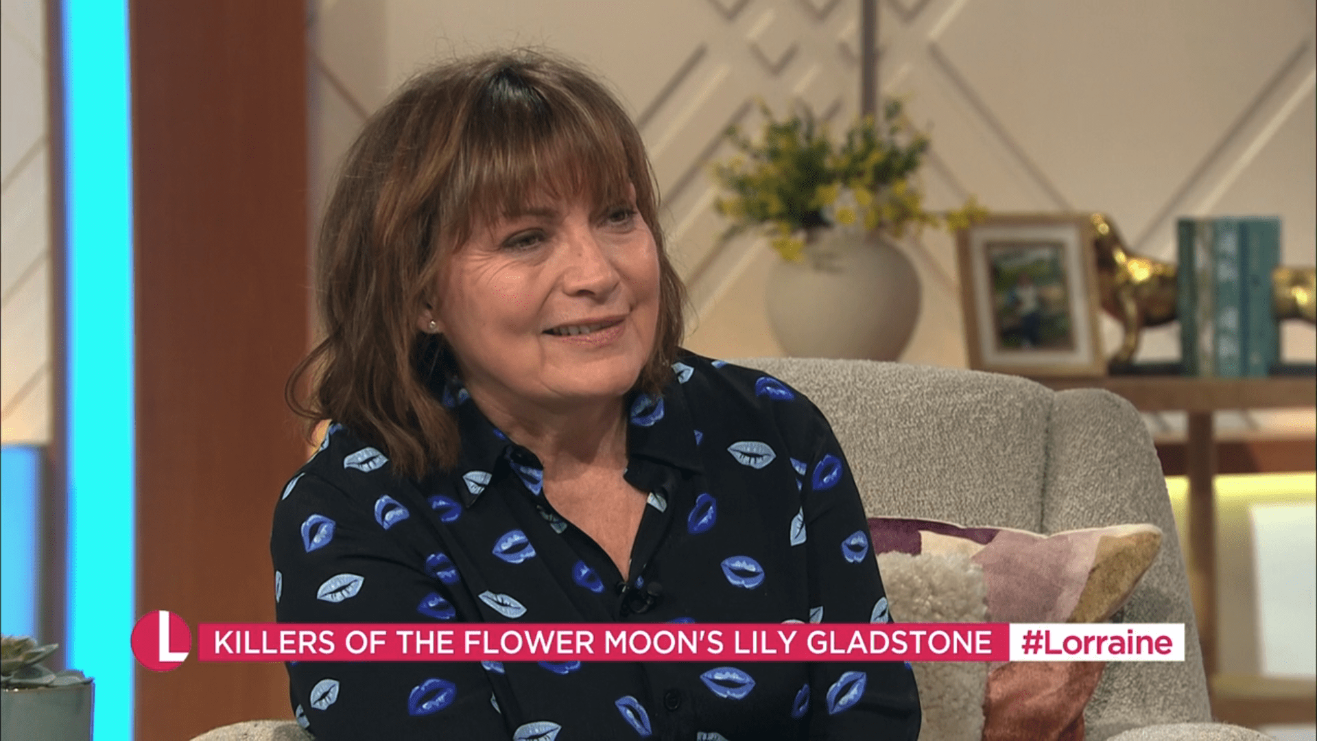 Lorraine Kelly smiling in a black shirt