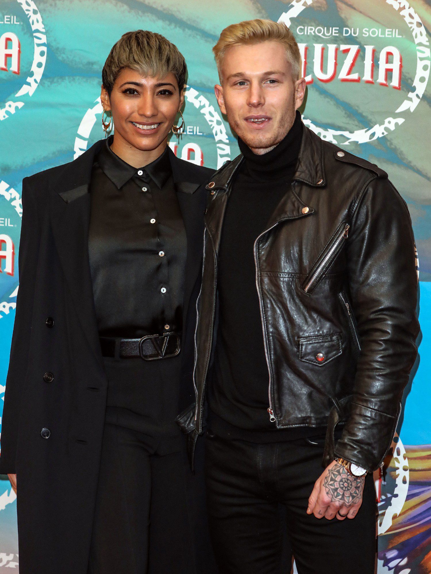 Karen Hauer and ex husband posing at event