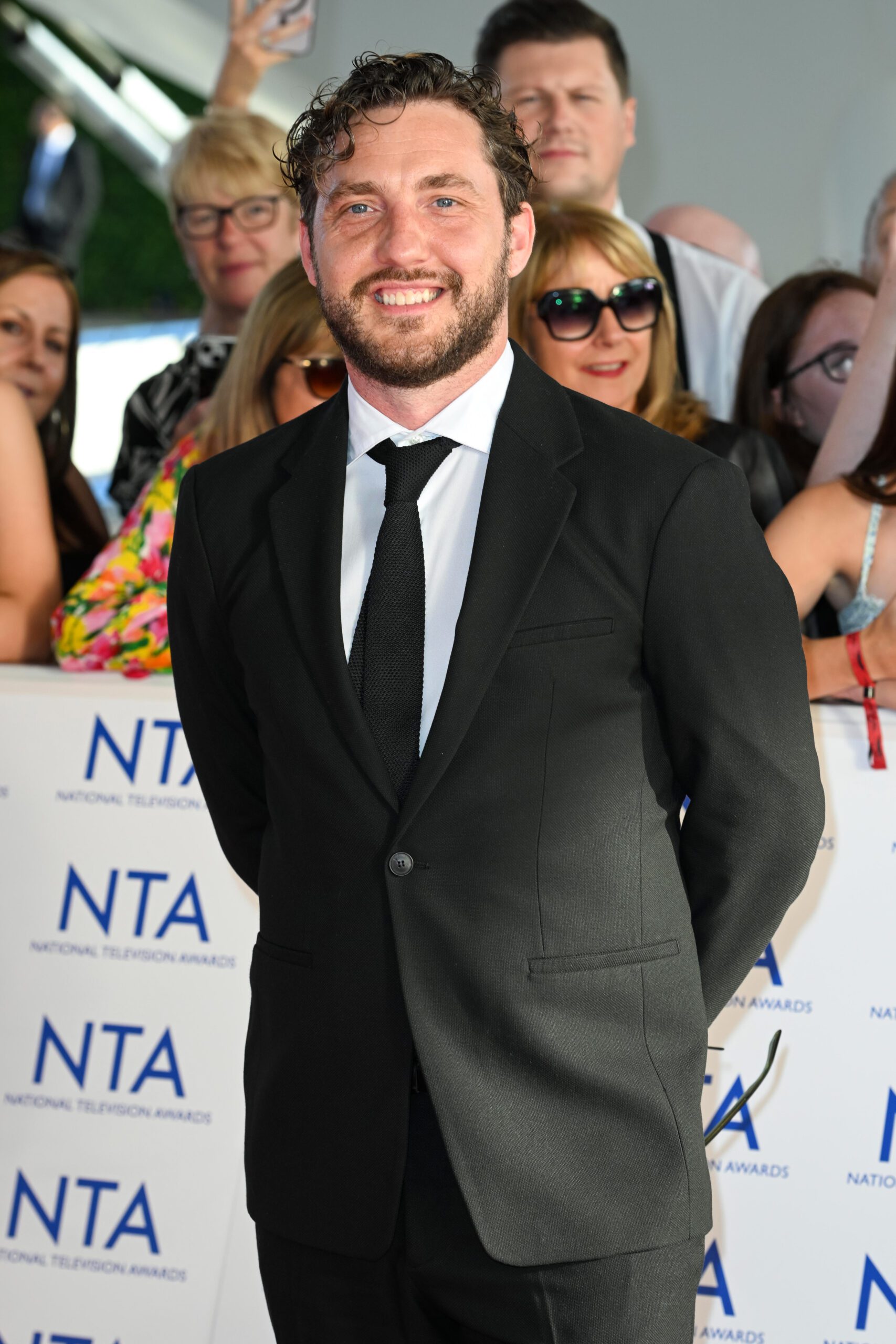 Seann Walsh at the NTAs in a suit and tie