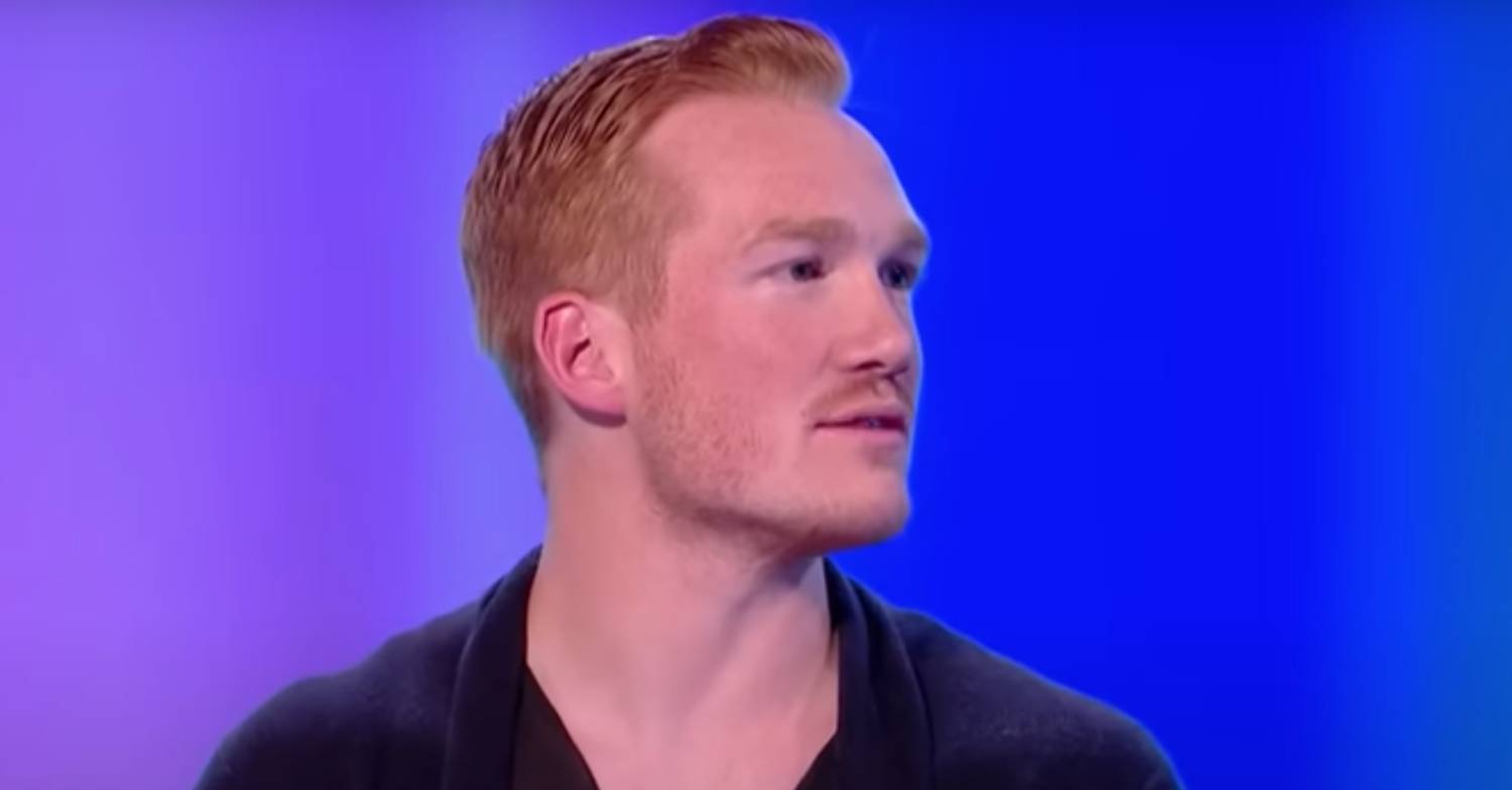 Greg Rutherford listens