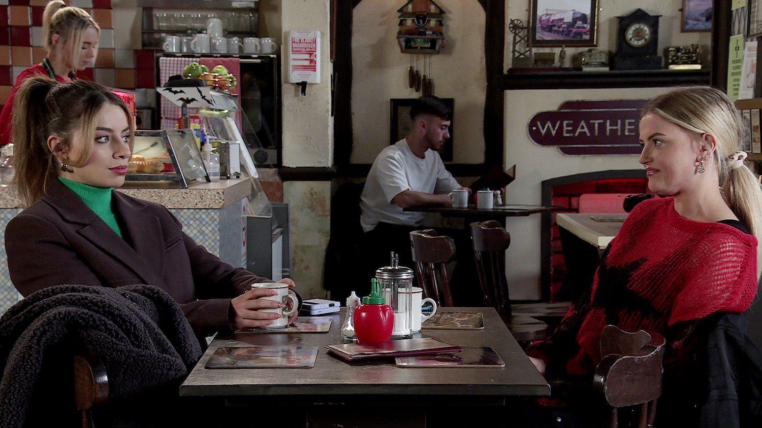 Daisy and Bethany eye each other over a coffee in Corrie