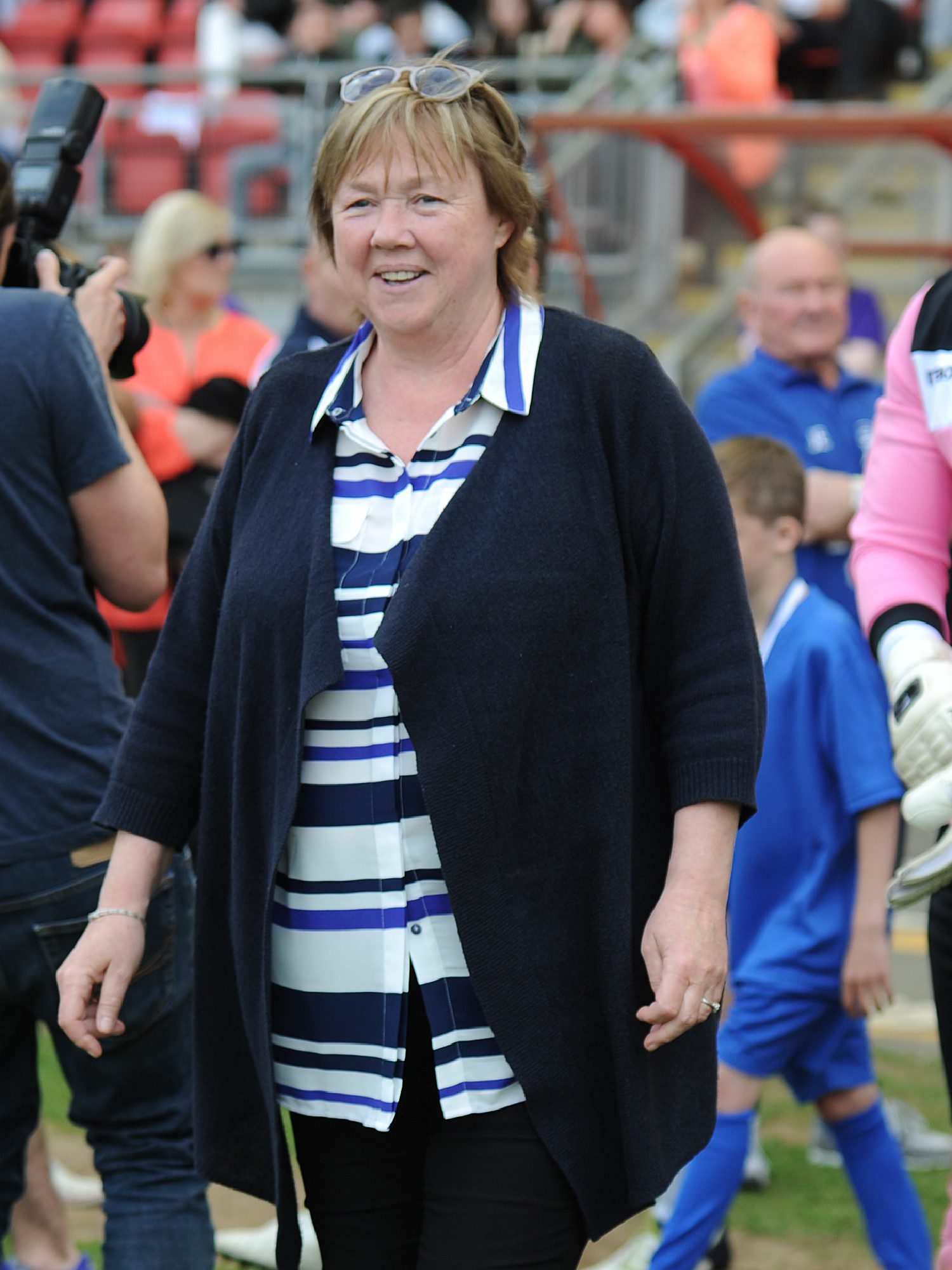 Pauline Quirke smiling at football match
