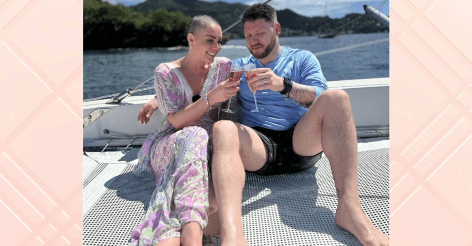 Amy Dowden clinks glasses with her husband