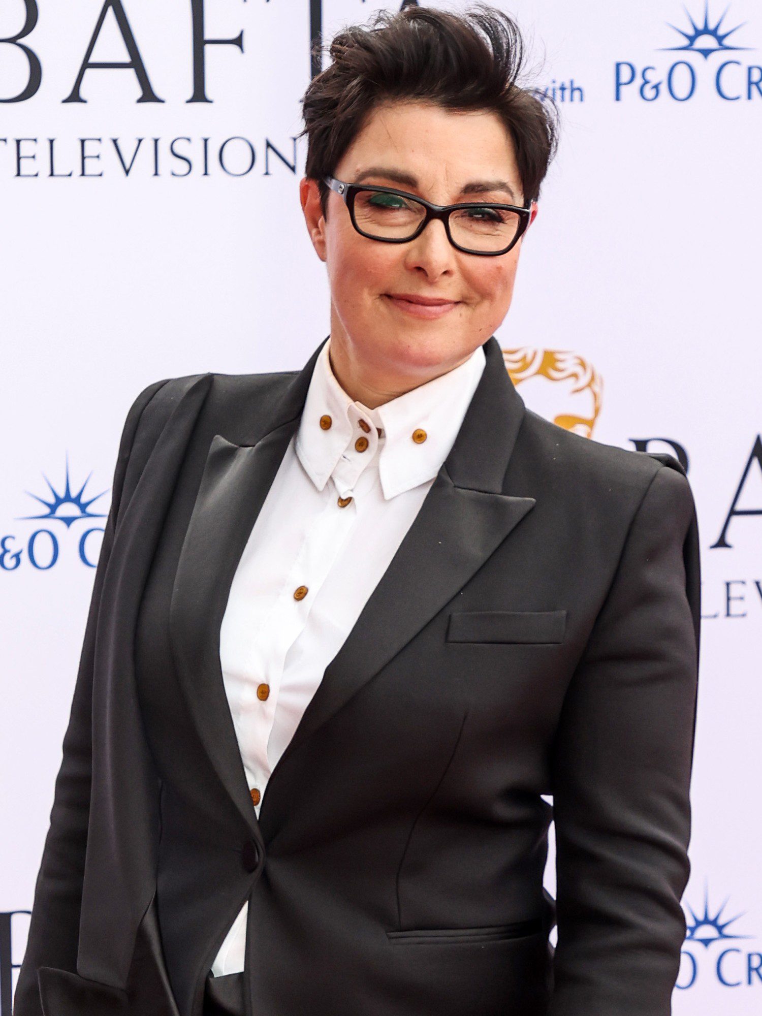 Sue Perkins smiling at the BAFTAS