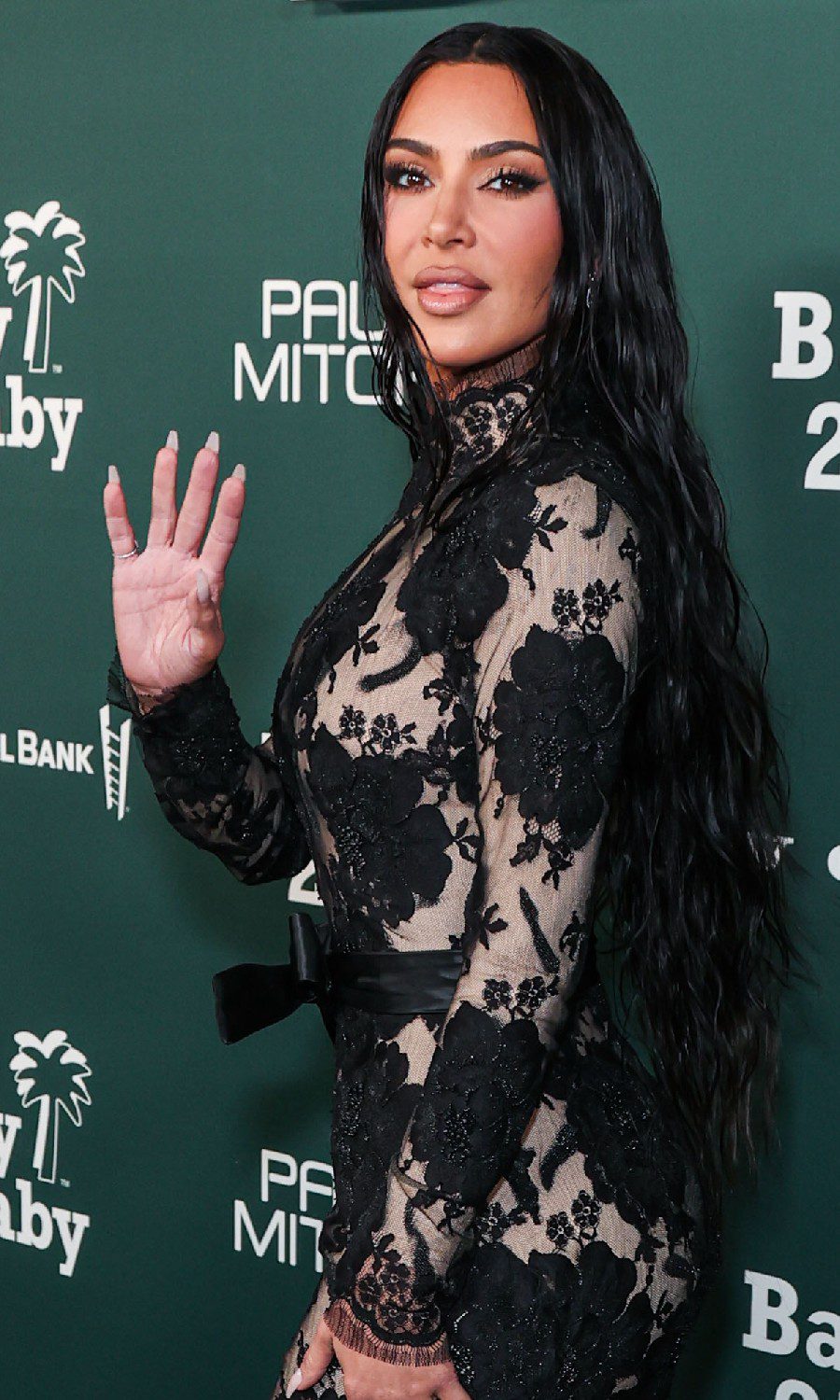Kim Kardashian waving at event
