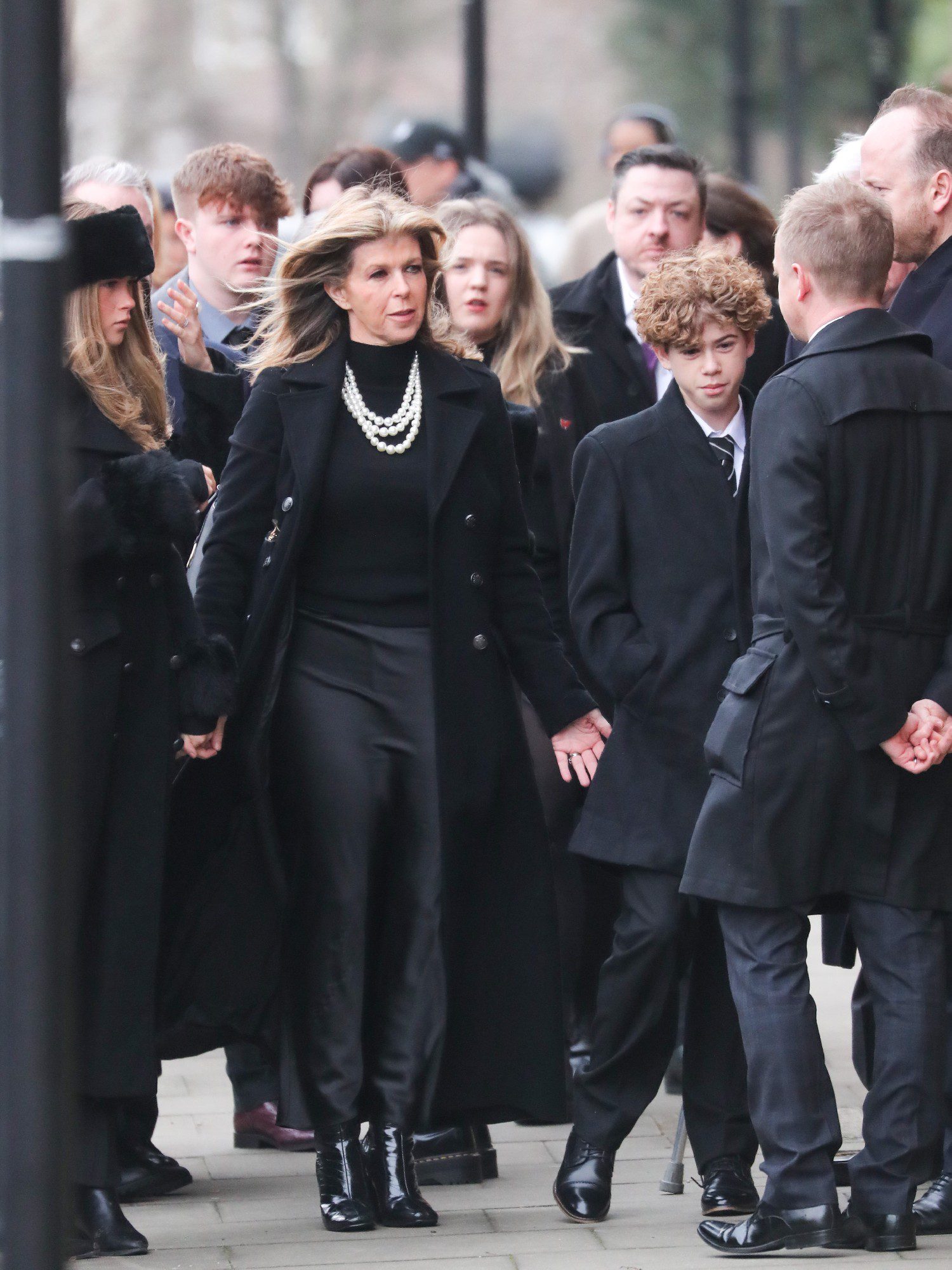 Kate Garraway with her children at Derek Draper's funeral