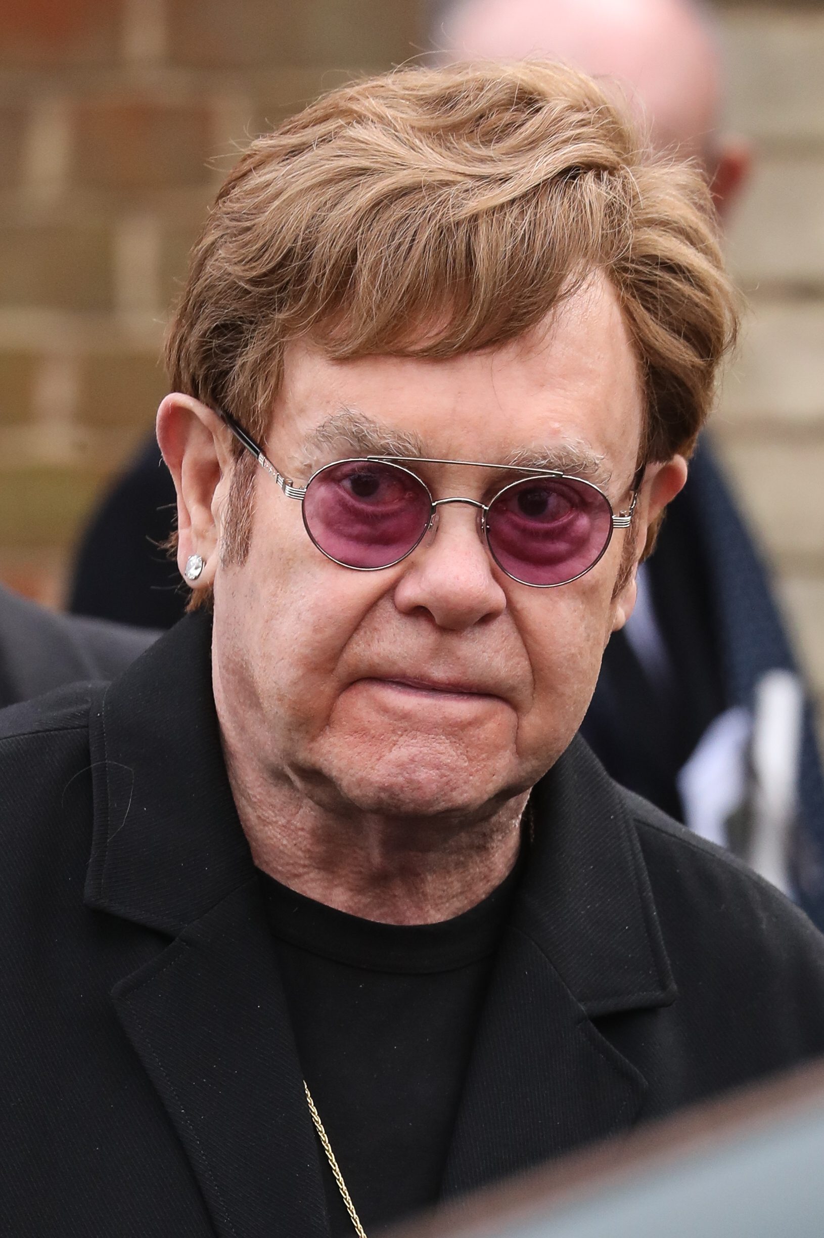 Elton John at Derek Draper's funeral