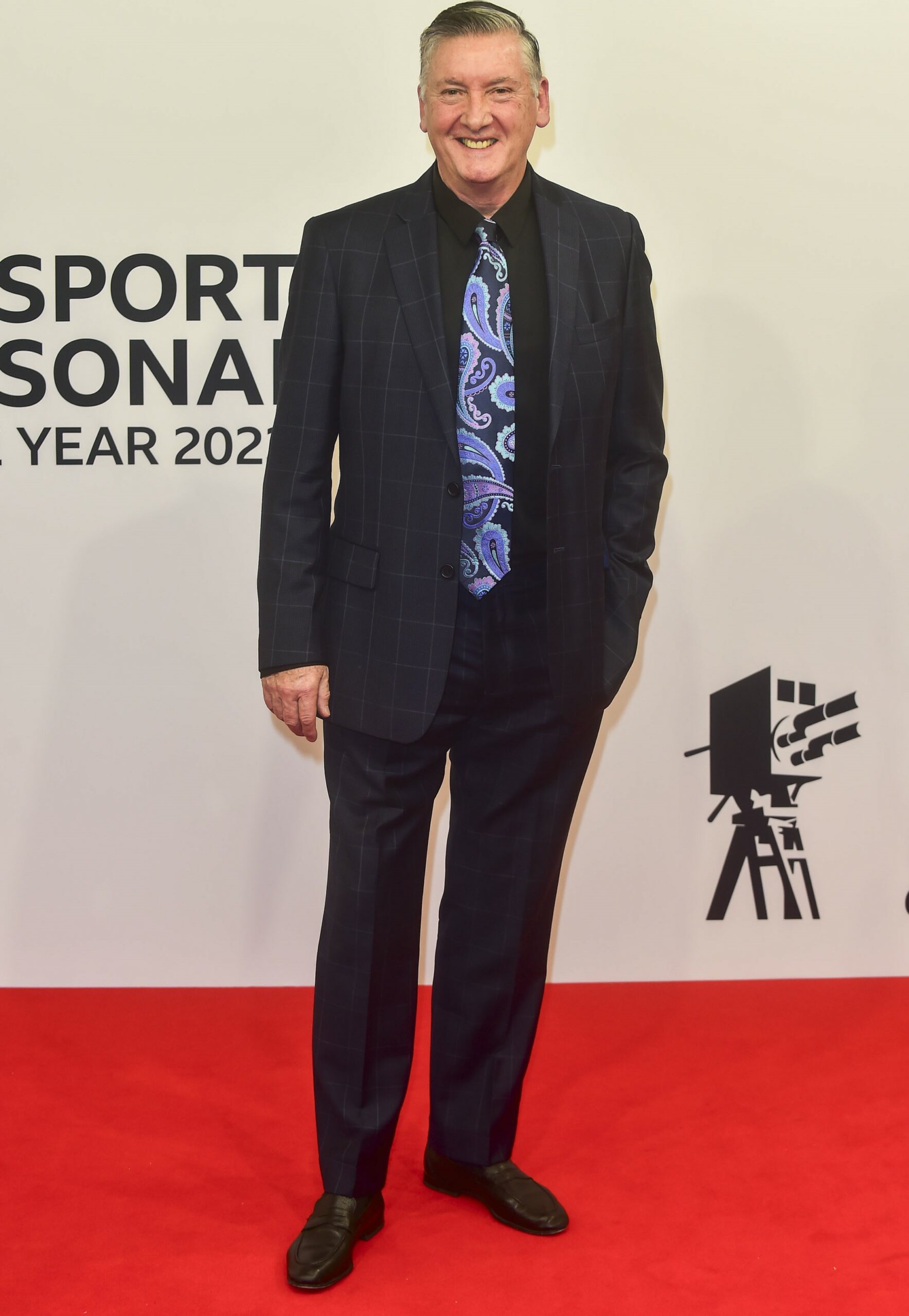 Robin Cousins smiling at event