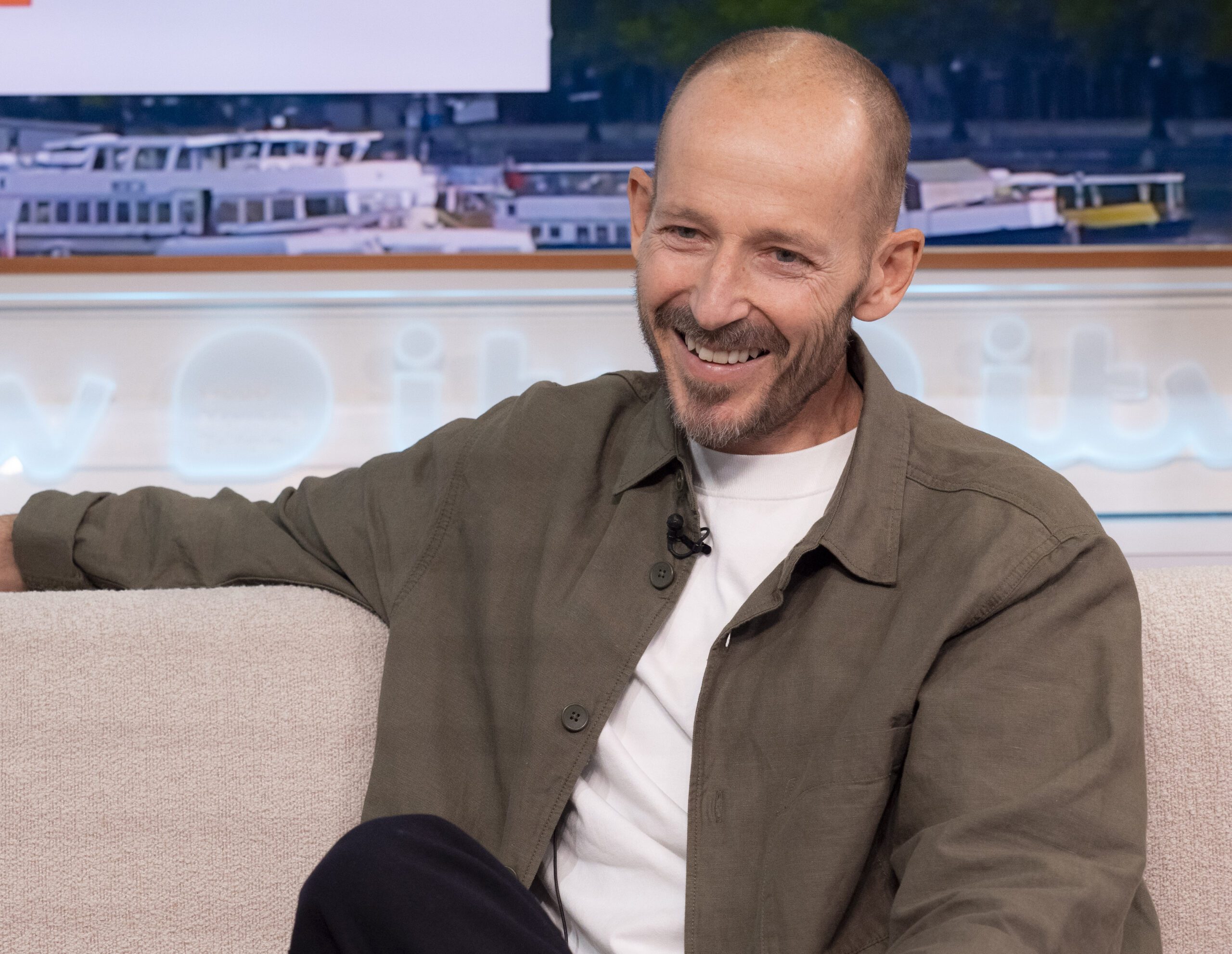 Jonnie Irwin smiles on the GMB sofa
