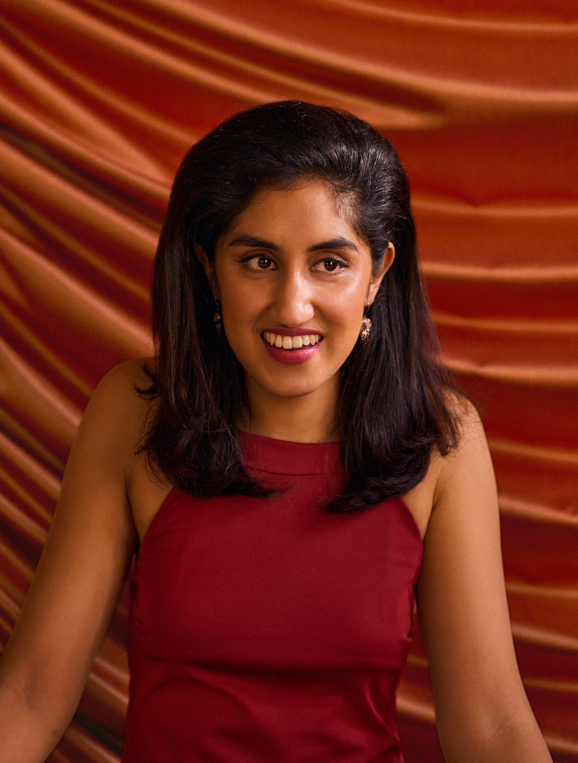 Ambika Mod as Emma Morley delivering a toast at her best friend's wedding in Netflix series One Day