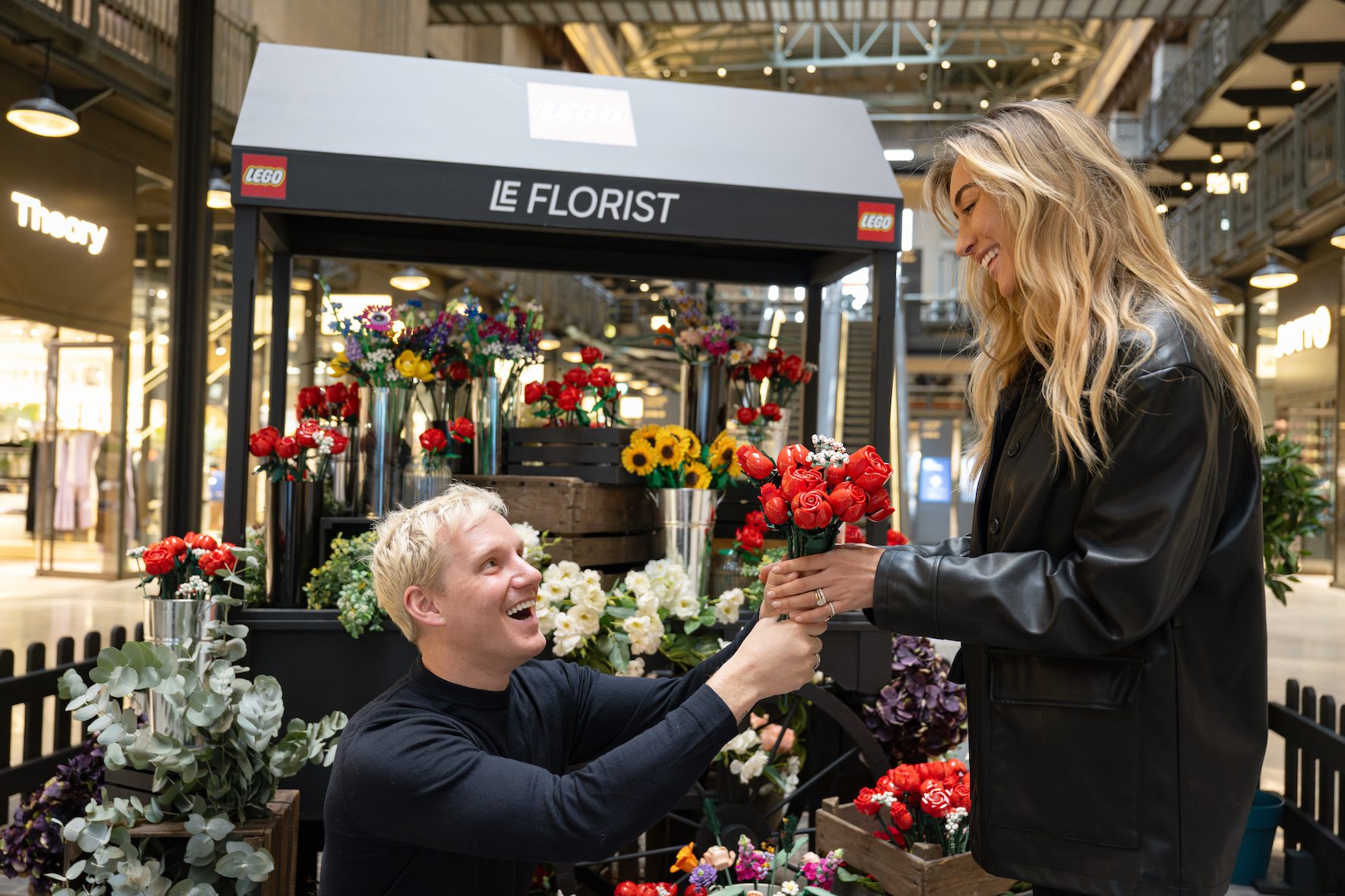 Jamie Laing and Sophie Habboo playing with Lego roses