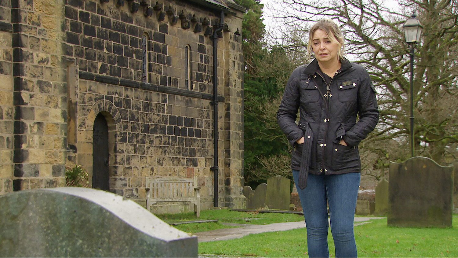 Charity looking over Harry's grave on Emmerdale