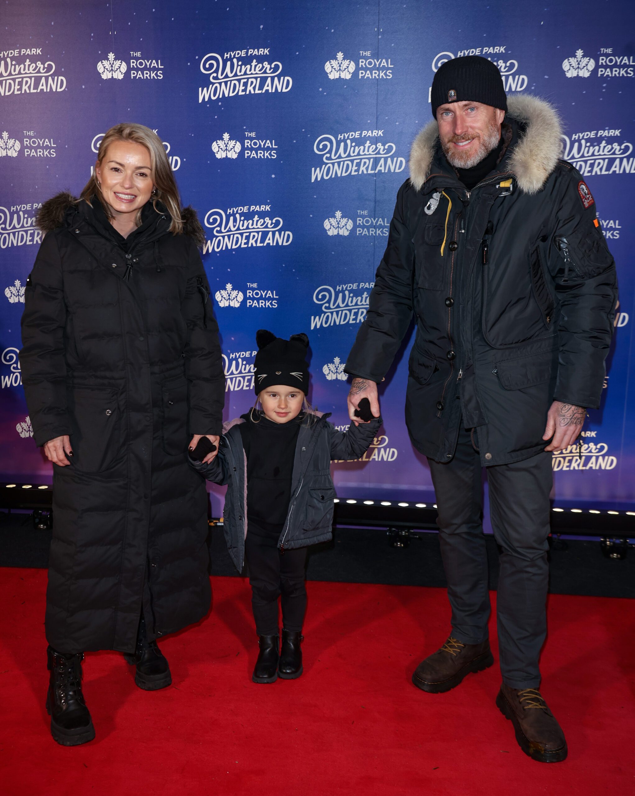 James Jordan and Ola Jordan on the red carpet with daughter Ella