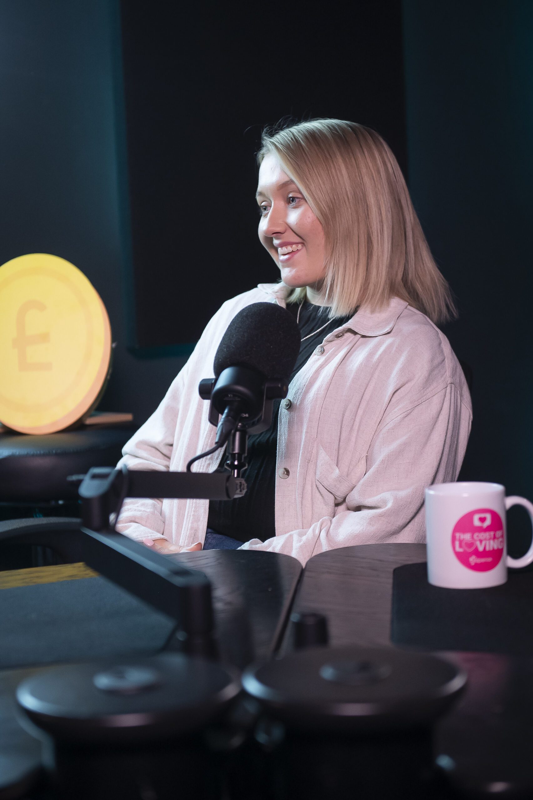 Woman recording a podcast