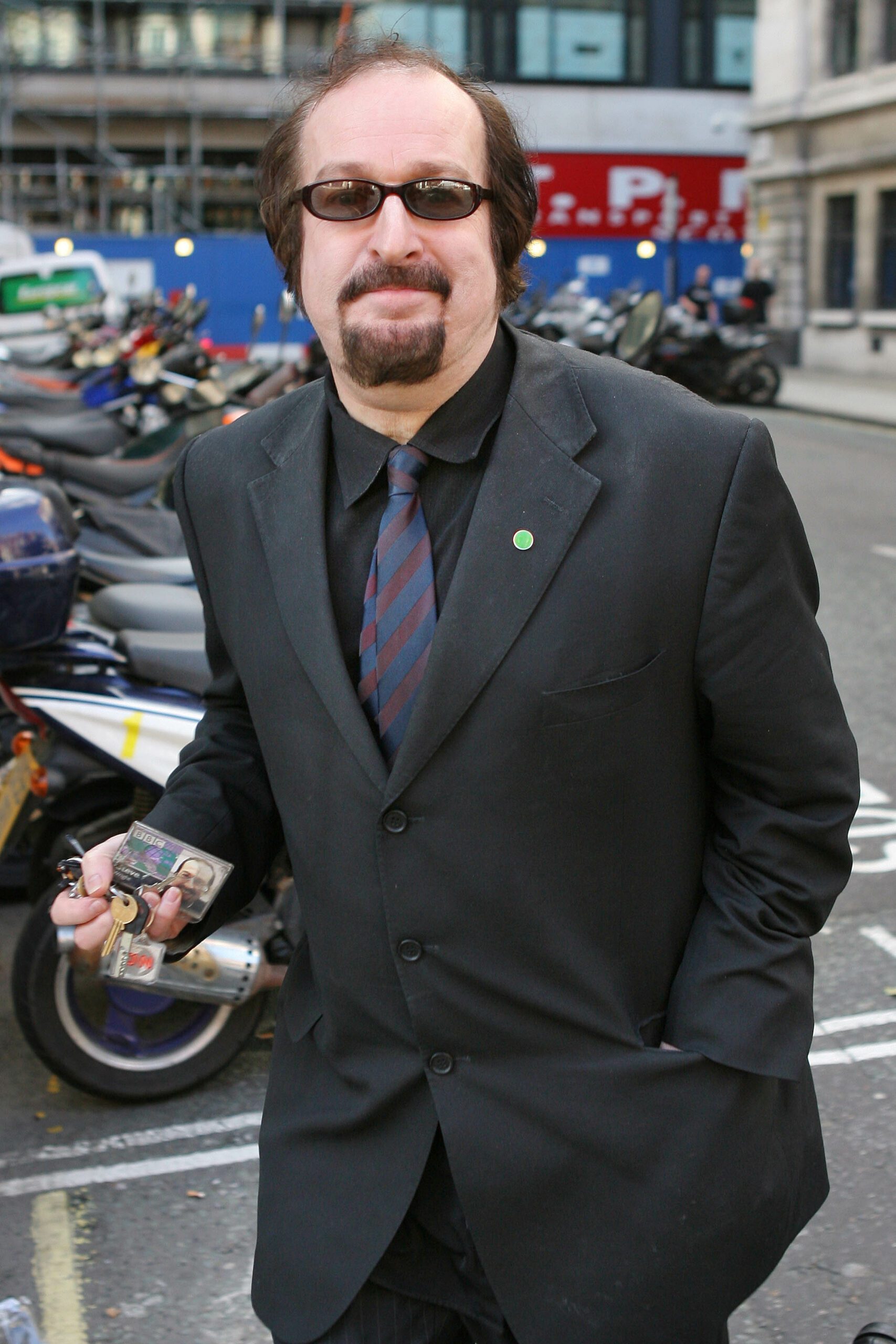 BBC Radio Two DJ Steve Wright wearing a black suit