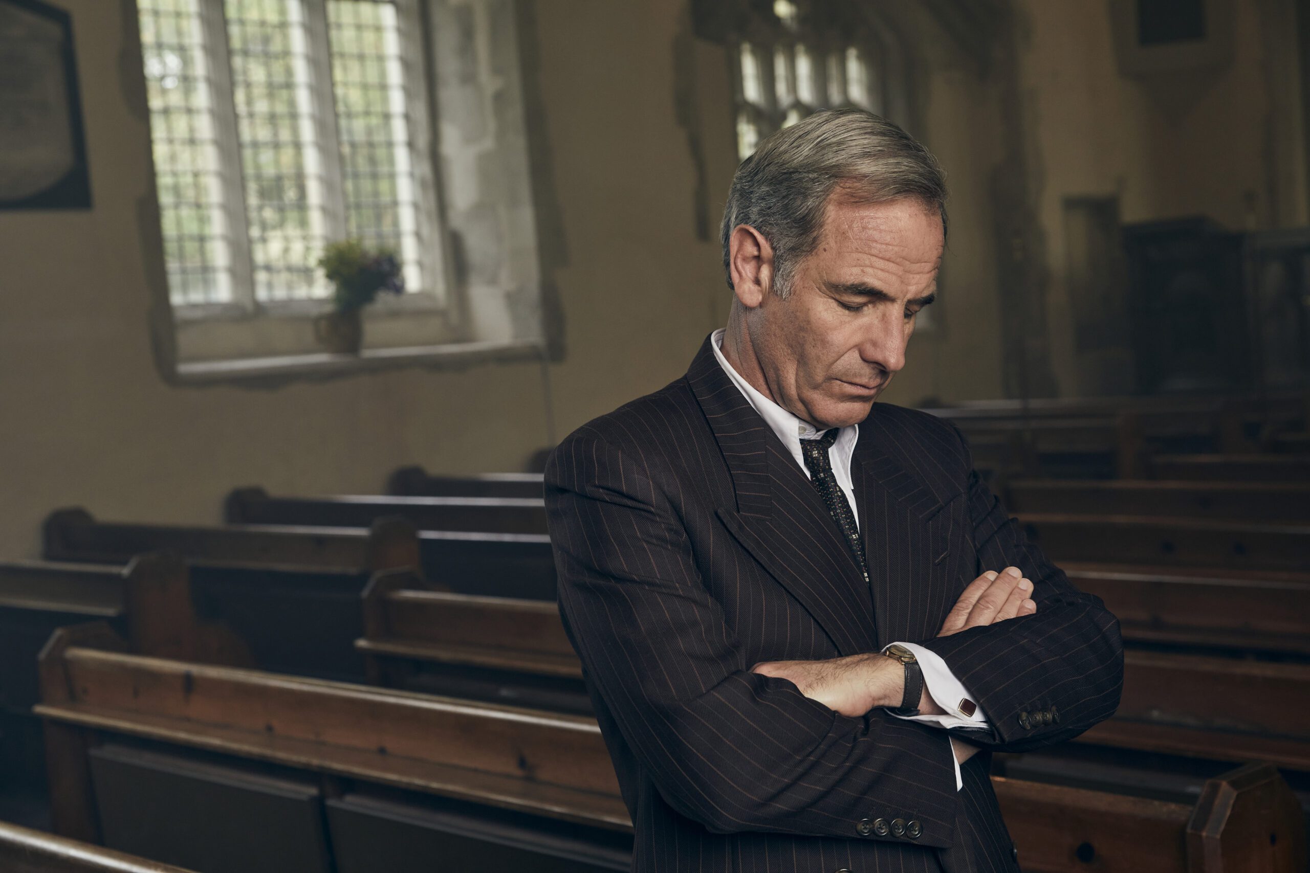 Robson Green as Geordie Keating, looking forlorn, in Grantchester