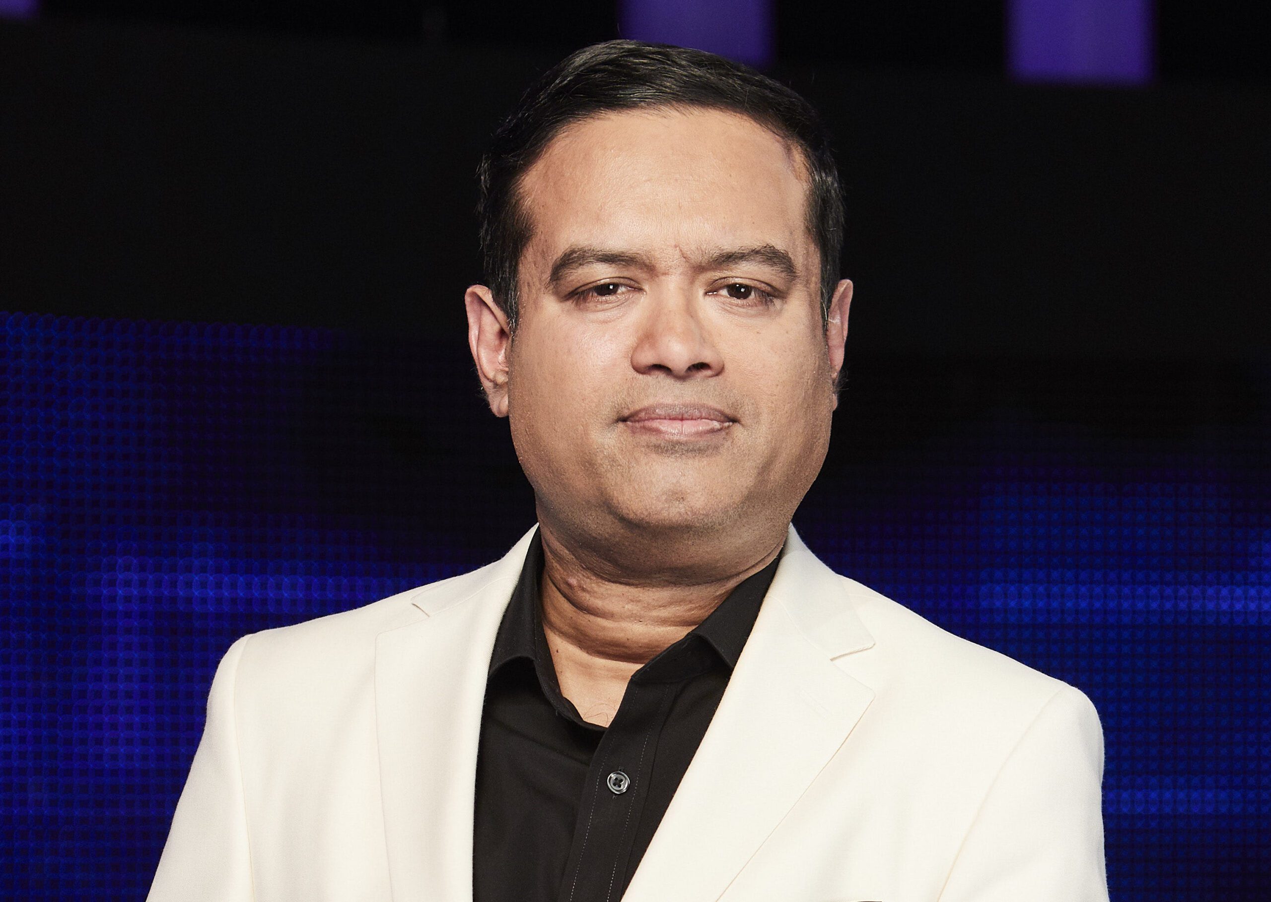 The Chase star Paul Sinha looking smart in promotional shot for the show