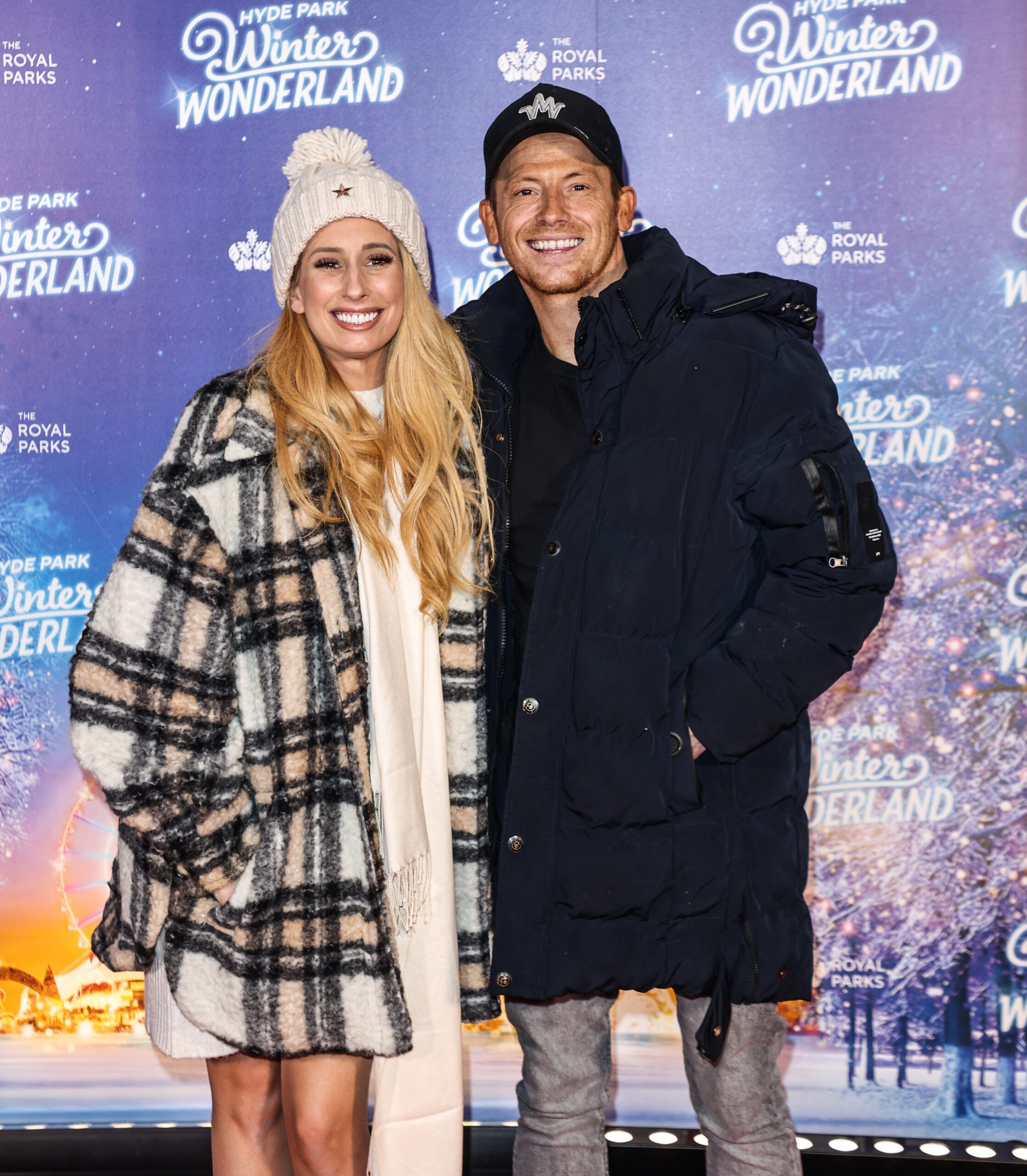Stacey Solomon and Joe Swash posing and smiling at Hyde Park Winter Wonderland 2022 Launch Night