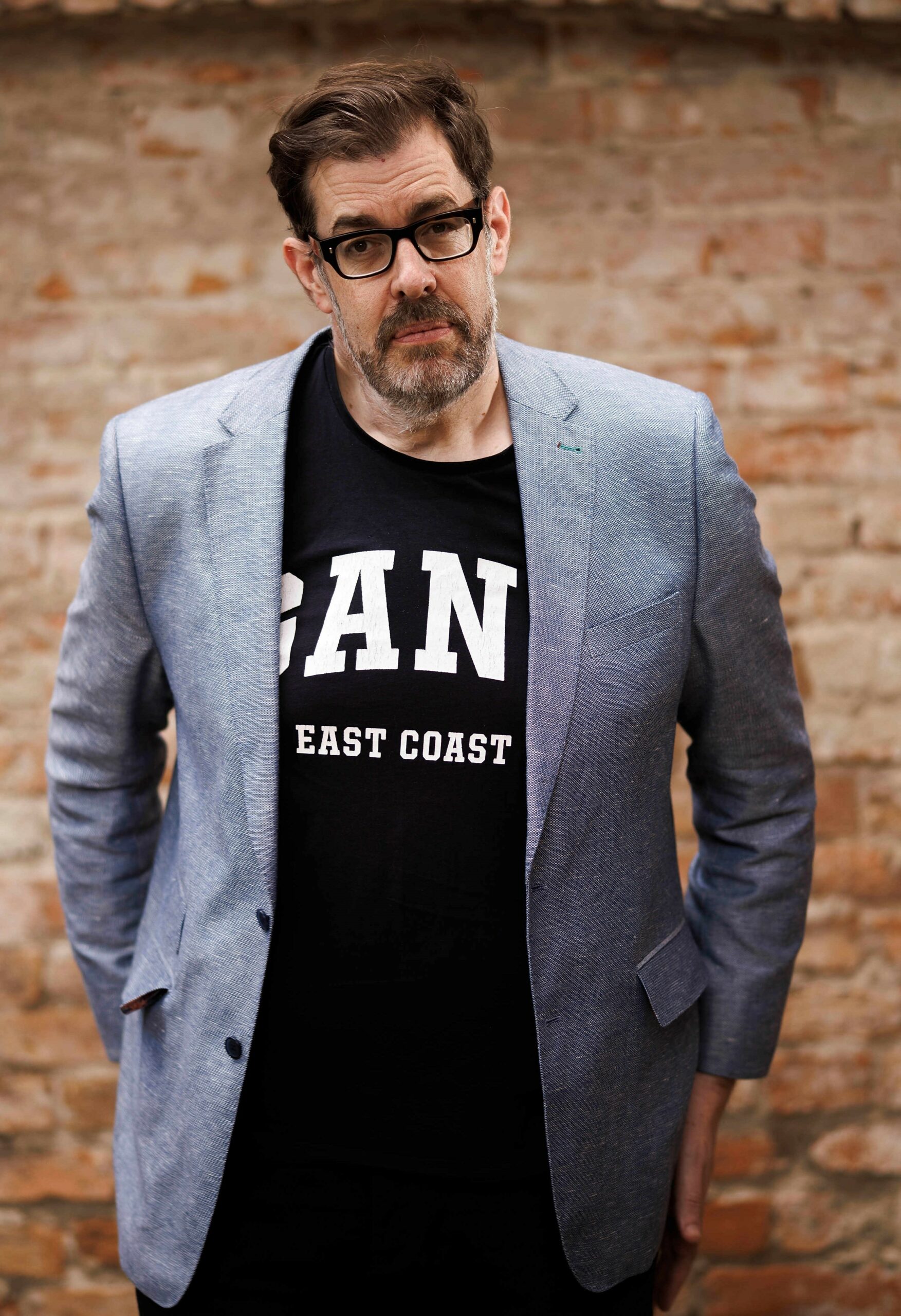 Richard Osman staring into the camera