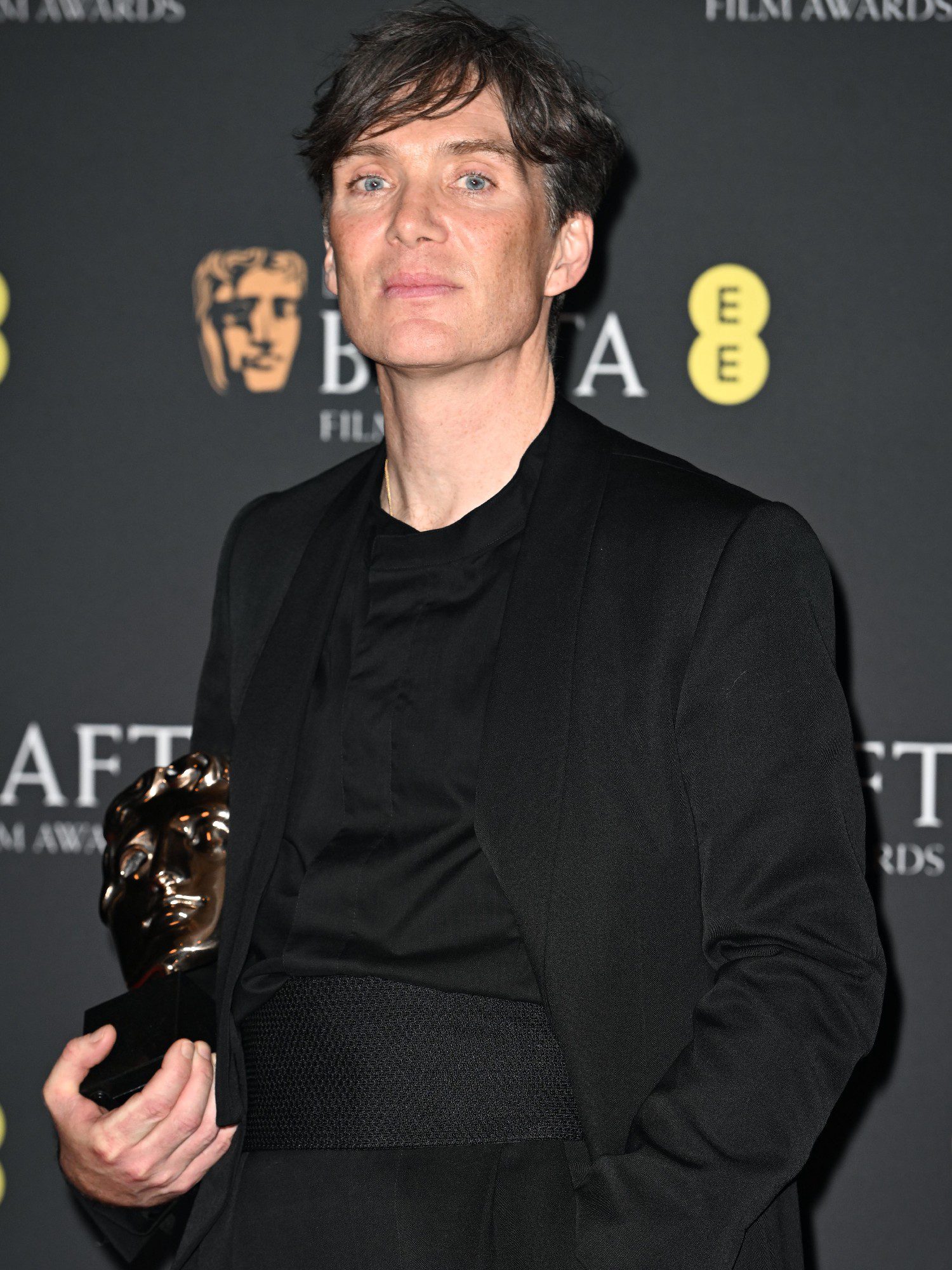 Cillian Murphy posing with BAFTA