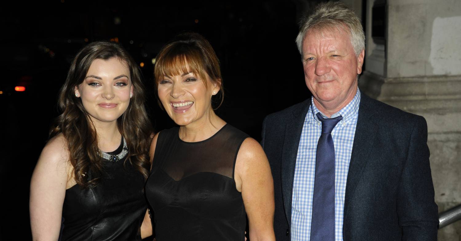 Lorraine Kelly smiles alongside daughter Rosie and husband Steve Smith