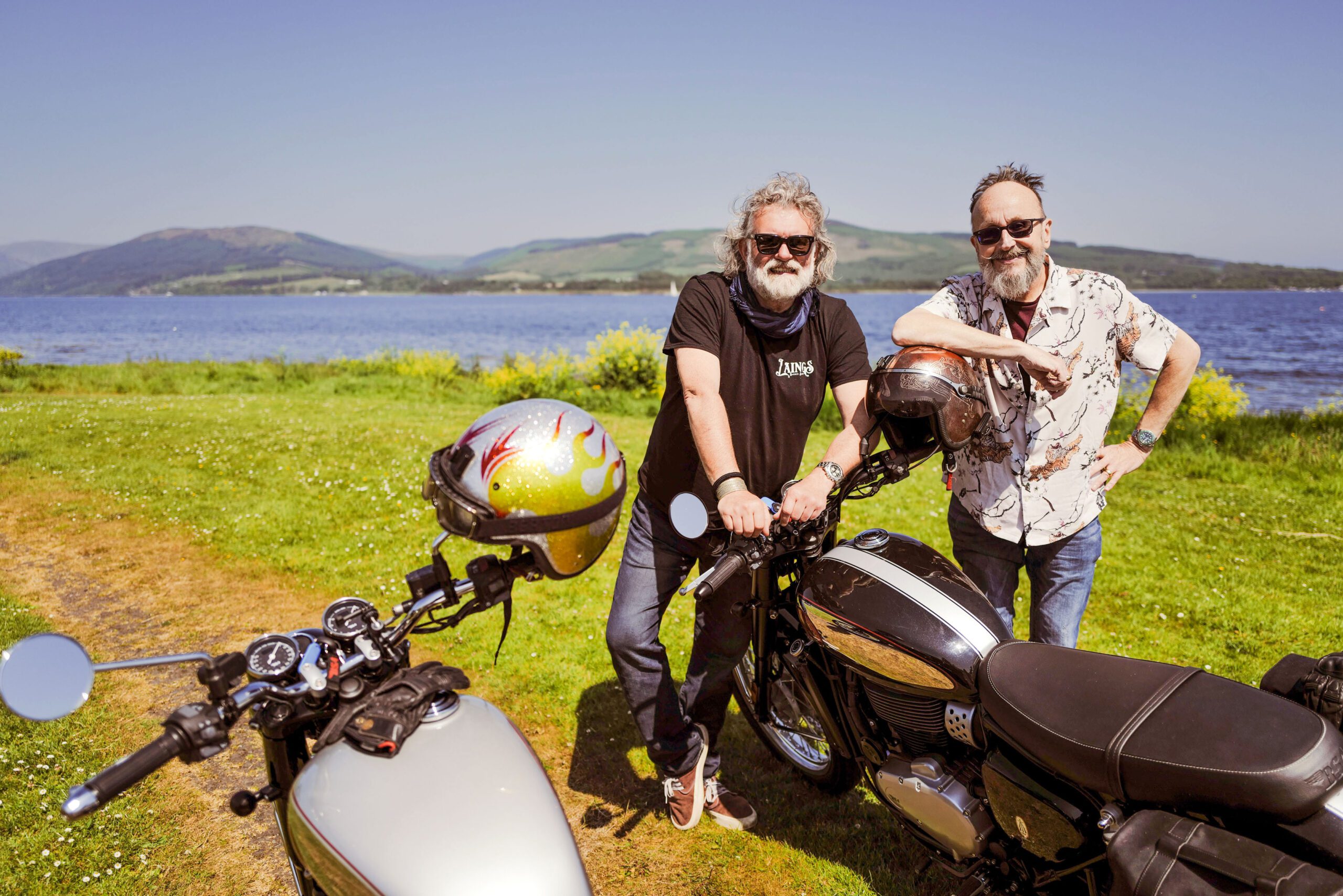 Si King and Dave Myers standing next to their motorbikes