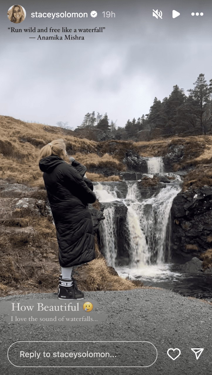Stacey Solomon next to a waterfall