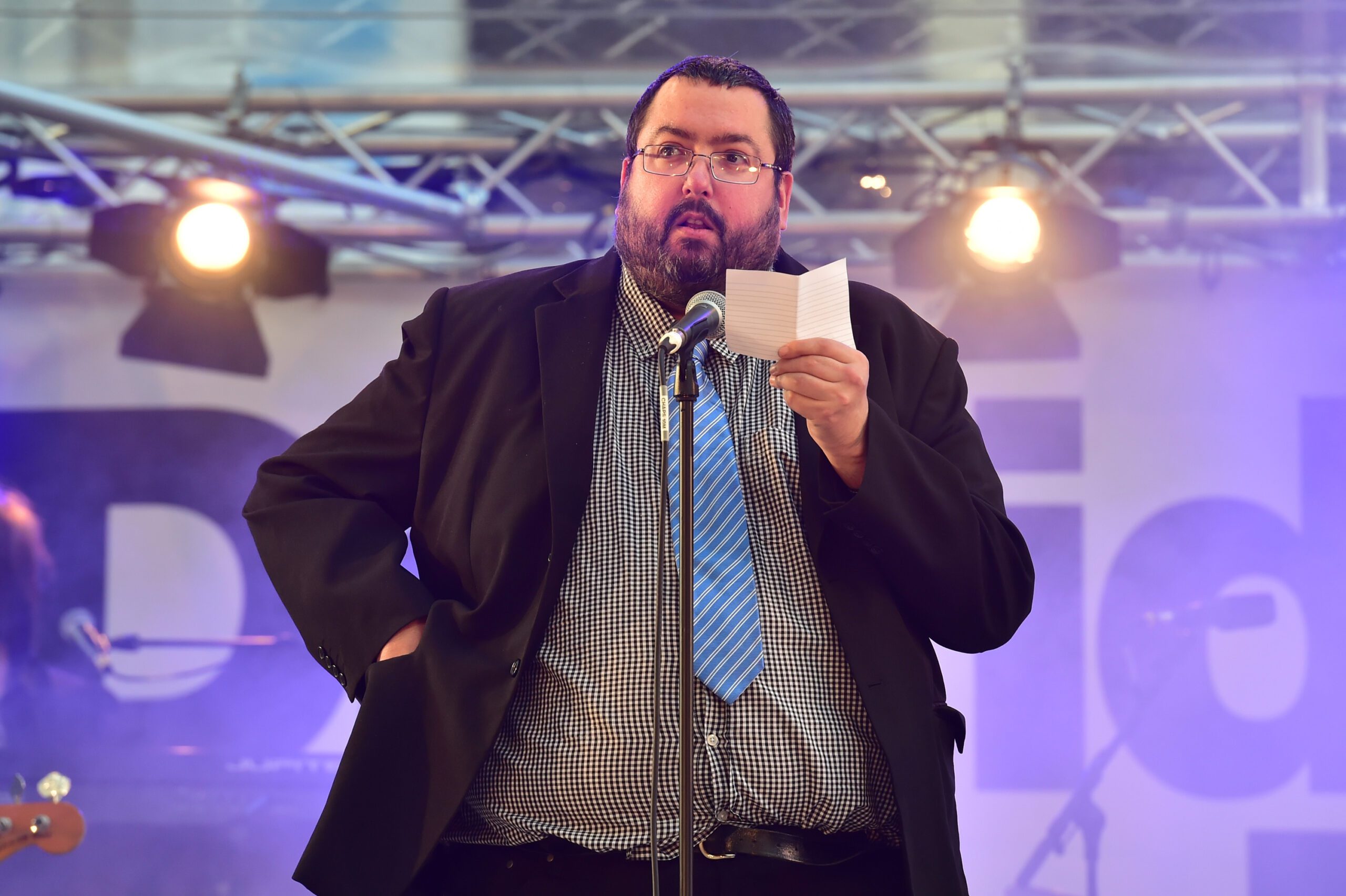 The Office star Ewen MacIntosh talking on stage